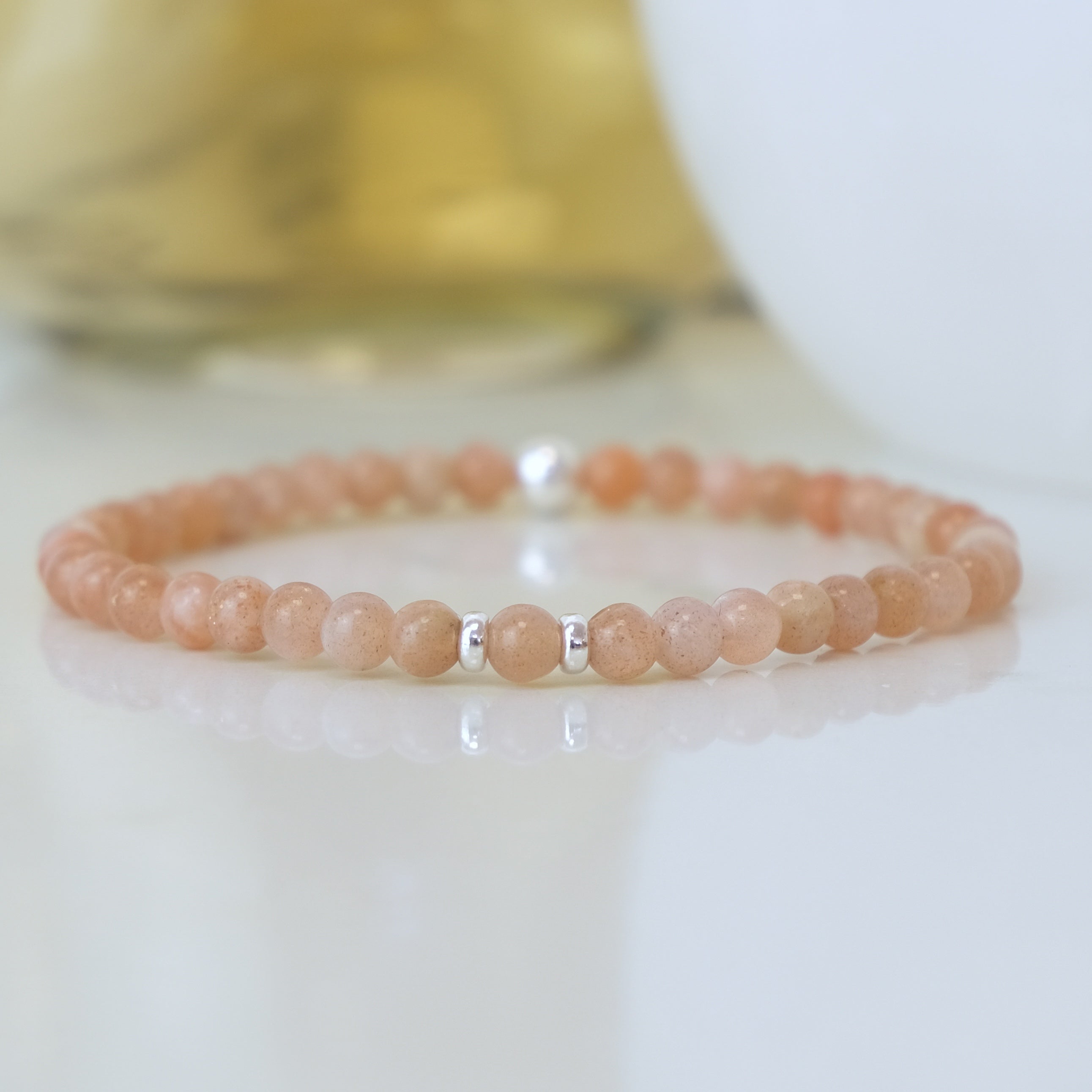 Sunstone gemstone bracelet in 4mm beads with Silver accents 