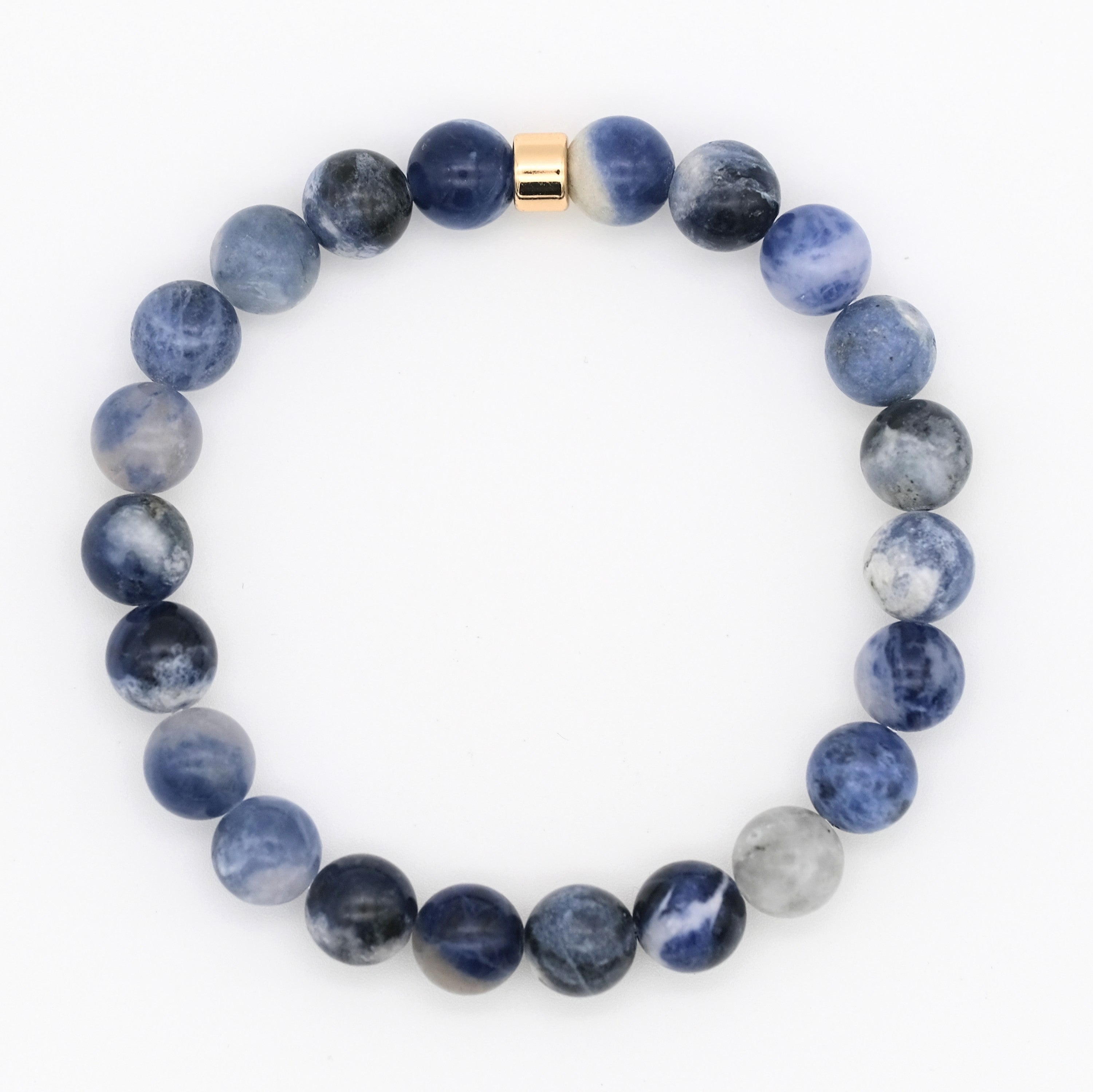 Sodalite gemstone bracelet with gold accessory from above