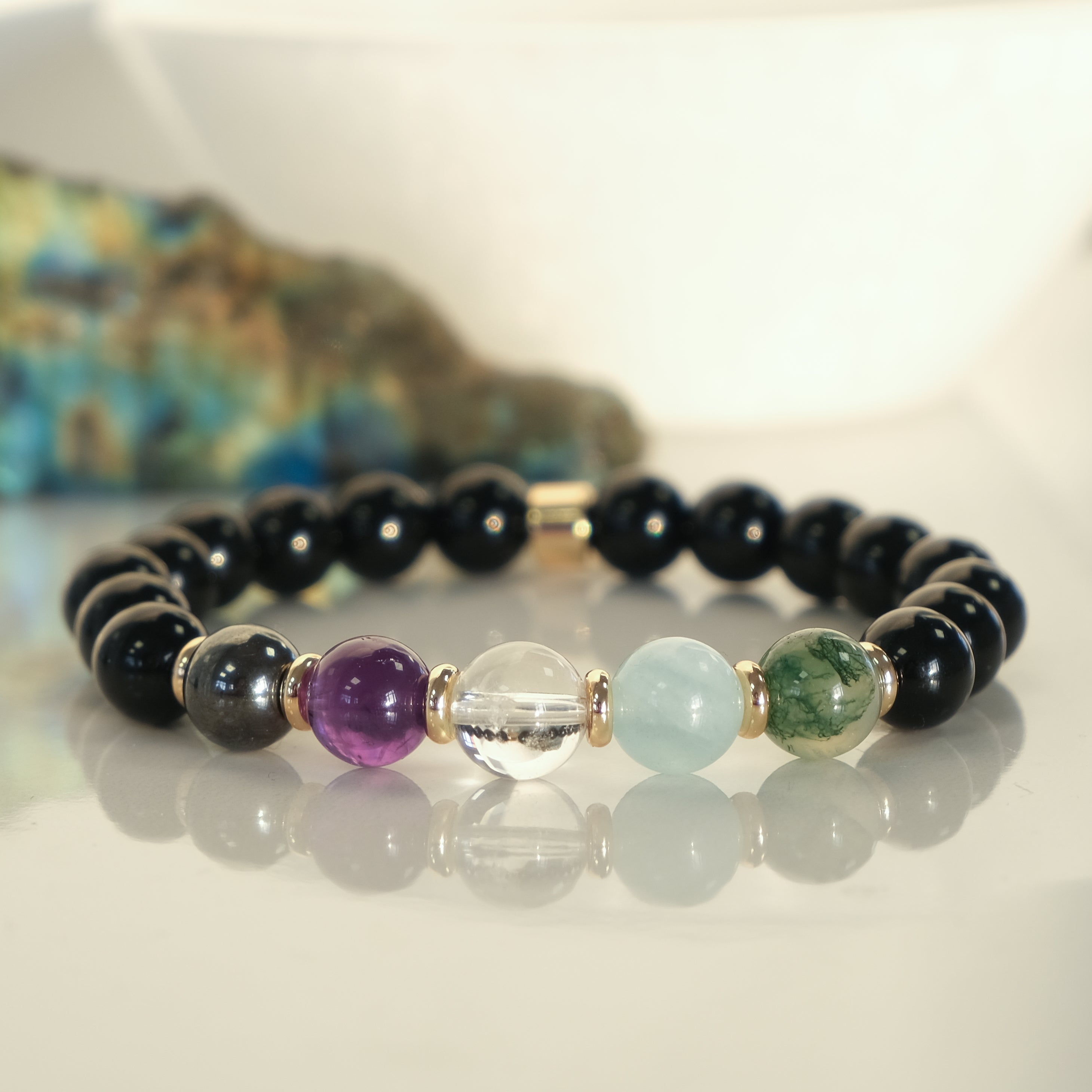 Aquarius zodiac crystal bracelet with gold accessories