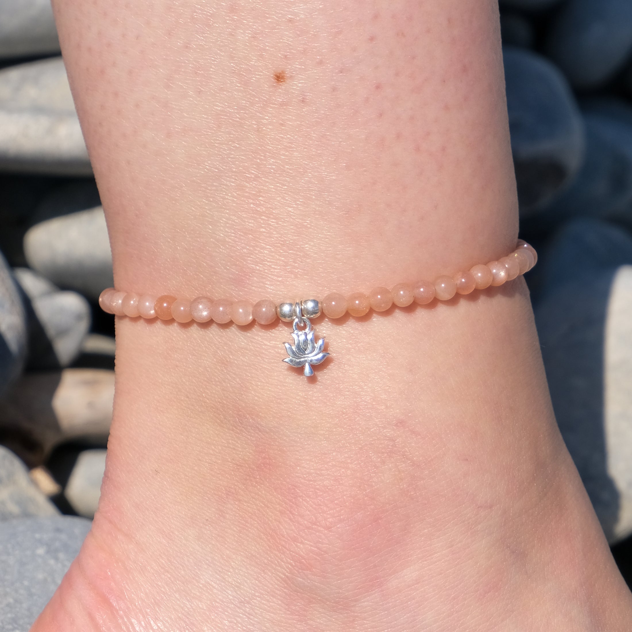 Sunstone crystal anklet with silver lotus charm
