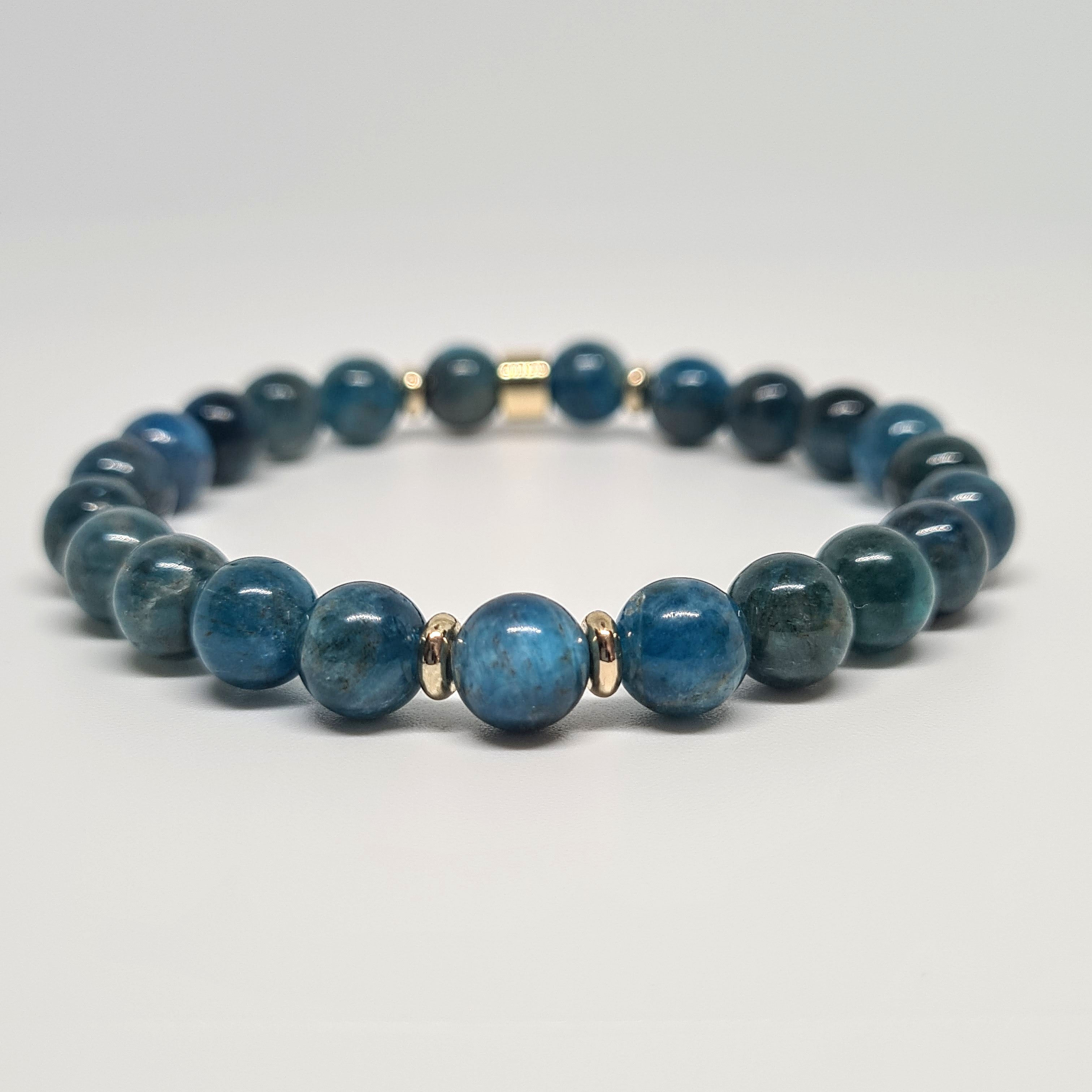Apatite gemstone bracelet in 8mm with gold accessories