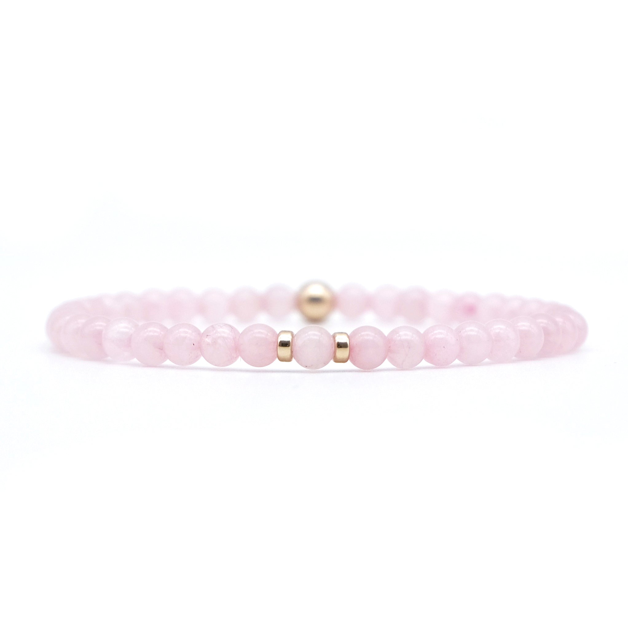 A rose quartz gemstone bracelet in 4mm beads with gold filled accessories