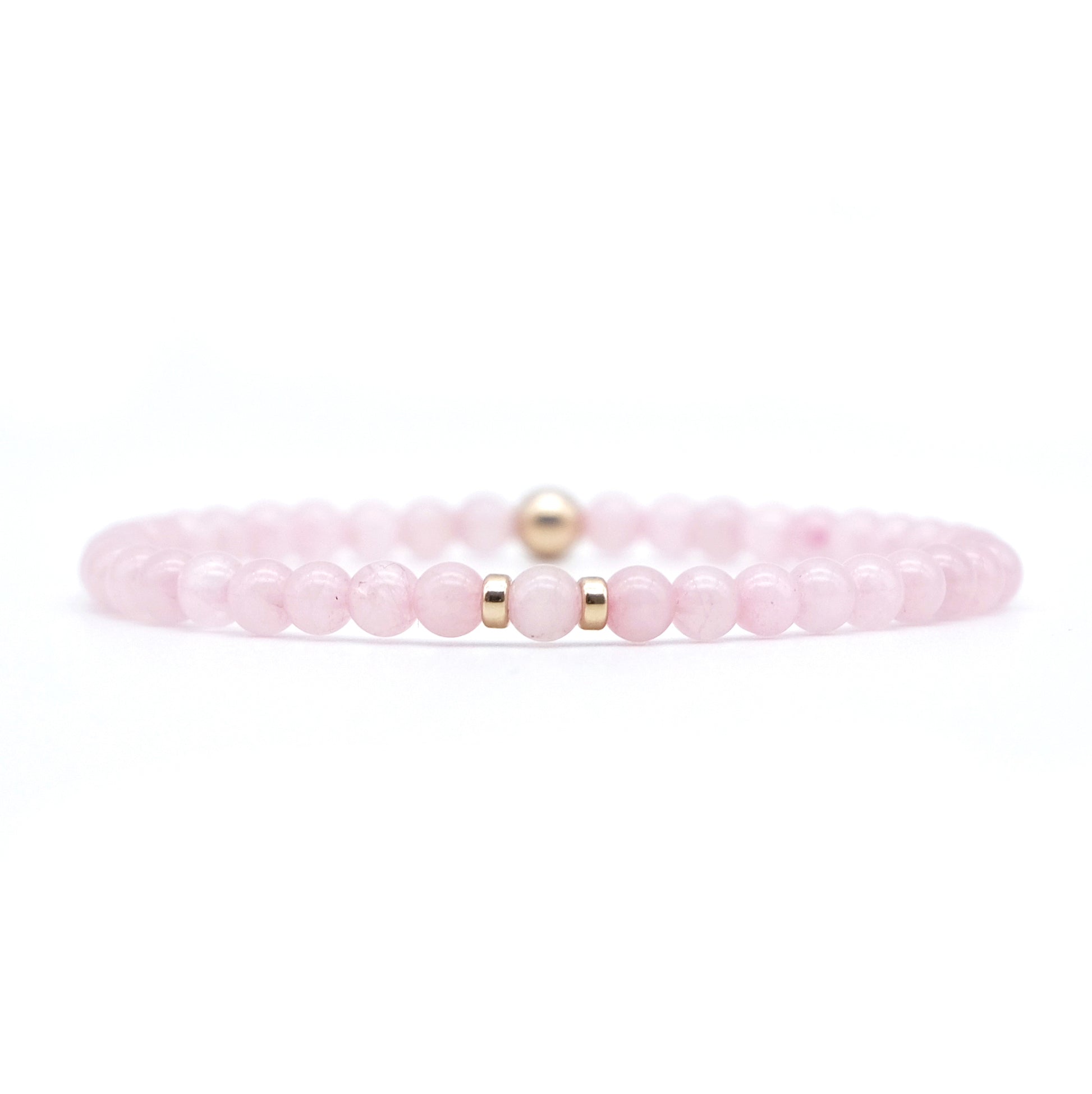 A rose quartz gemstone bracelet in 4mm beads with gold filled accessories