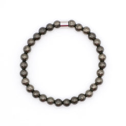 A pyrite gemstone bracelet in 5mm beads with steel accessory from above