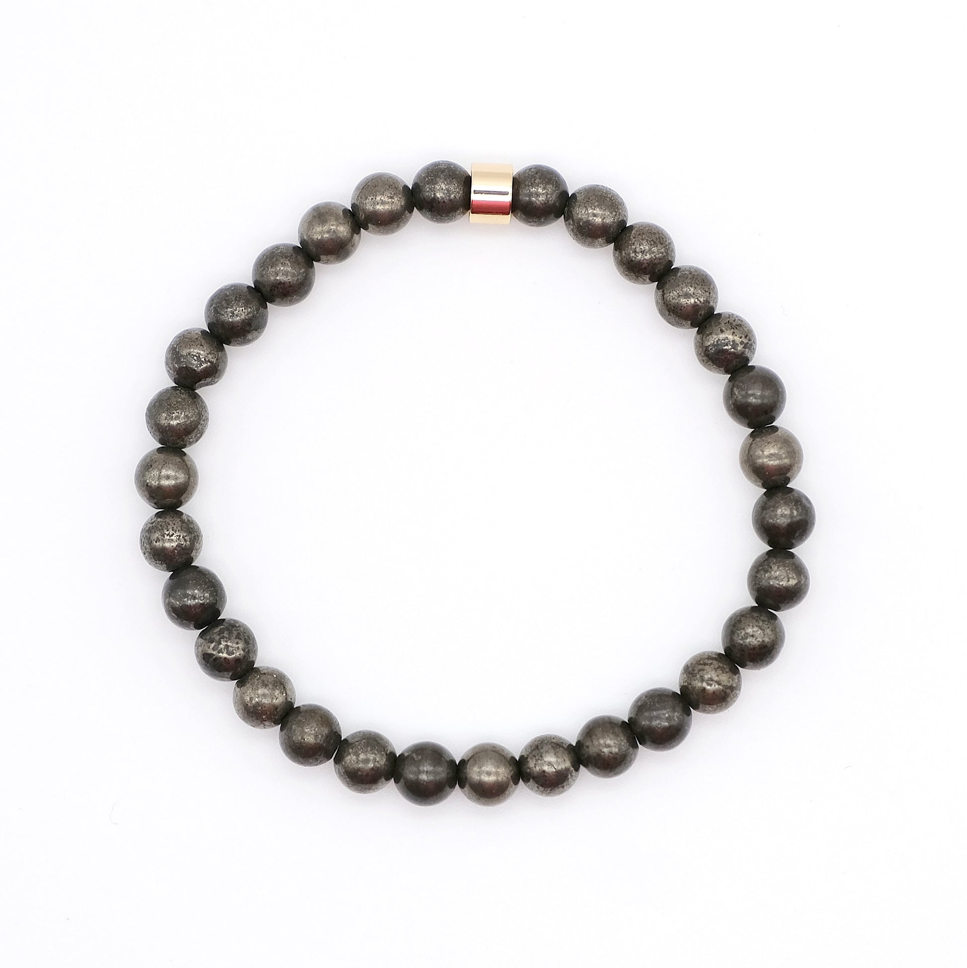 A pyrite gemstone bracelet in 5mm beads with gold accessory from above
