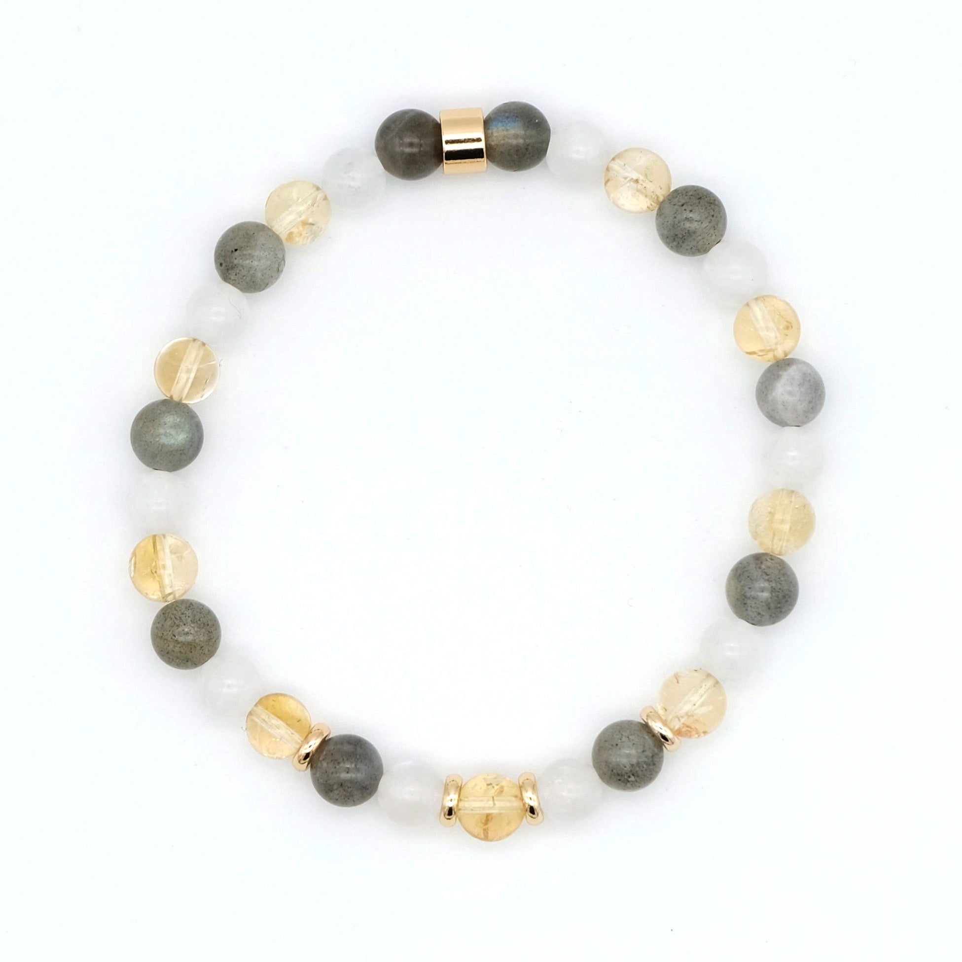 A citrine, labradorite and moonstone gemstone bracelet in 6mm beads with gold accessories from above