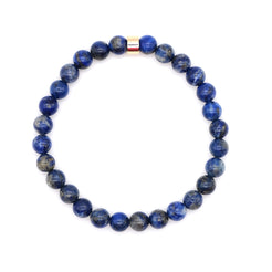 Lapis lazuli gemstone bracelet in 6mm beads with gold accessory from above