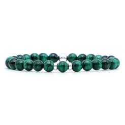 A malachite gemstone bracelet with silver accessories