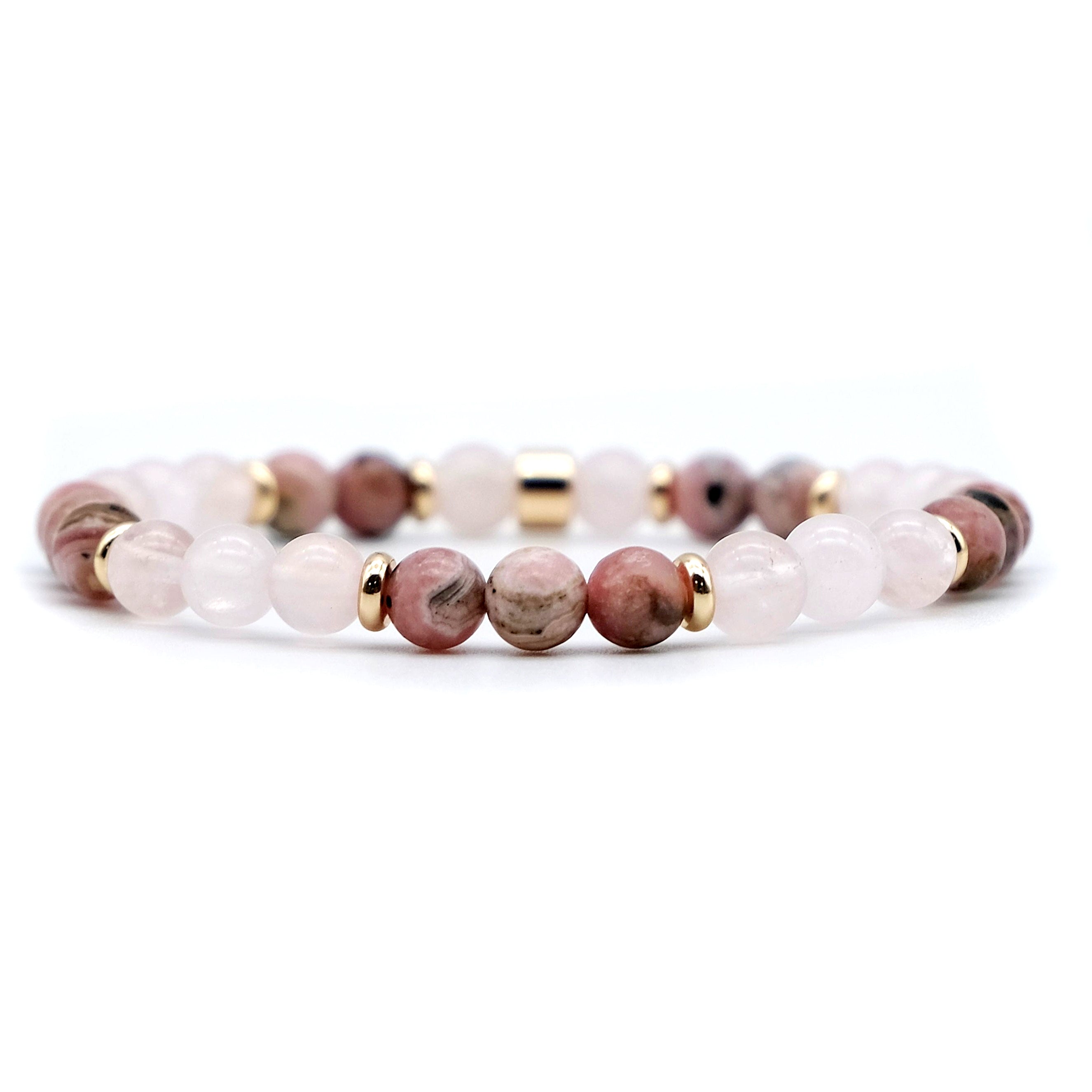 A Rhodochrosite and rose quartz gemstone bracelet in 6mm beads with gold accessories