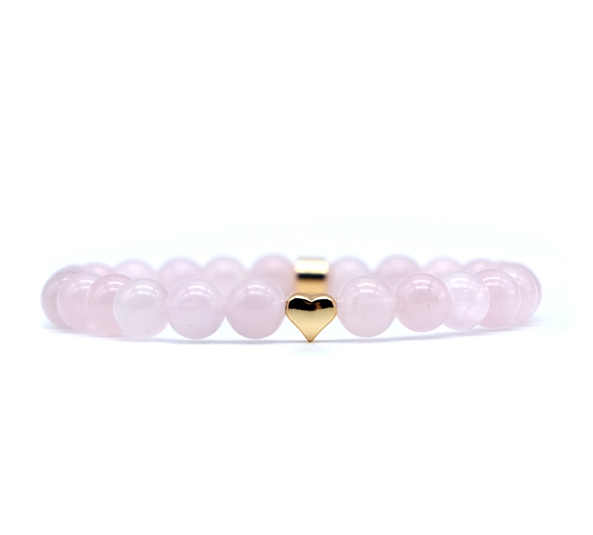 A rose quartz gemstone bracelet with gold love heart