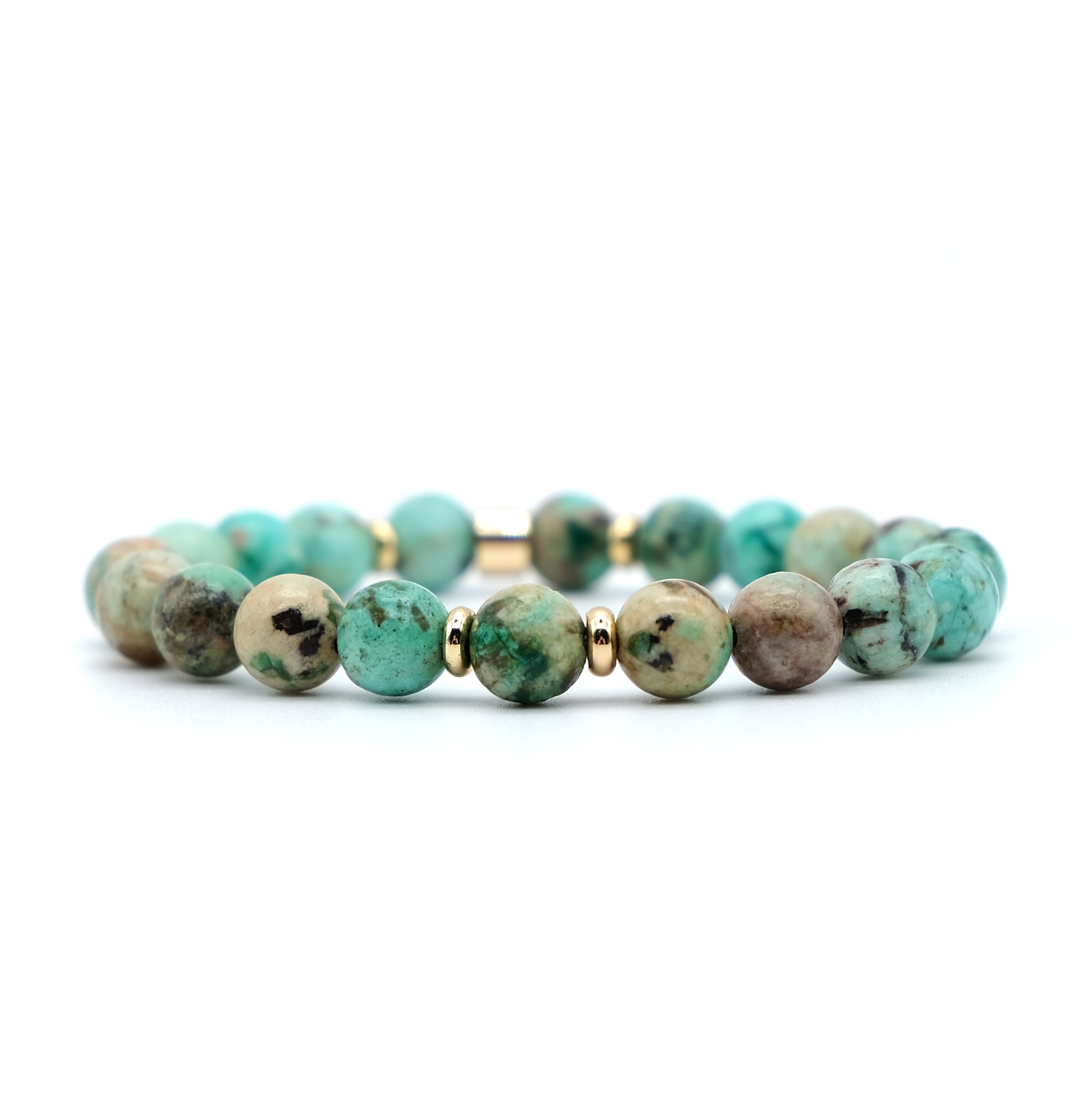 A chrysocolla gemstone bracelet in 8mm beads with gold accessories