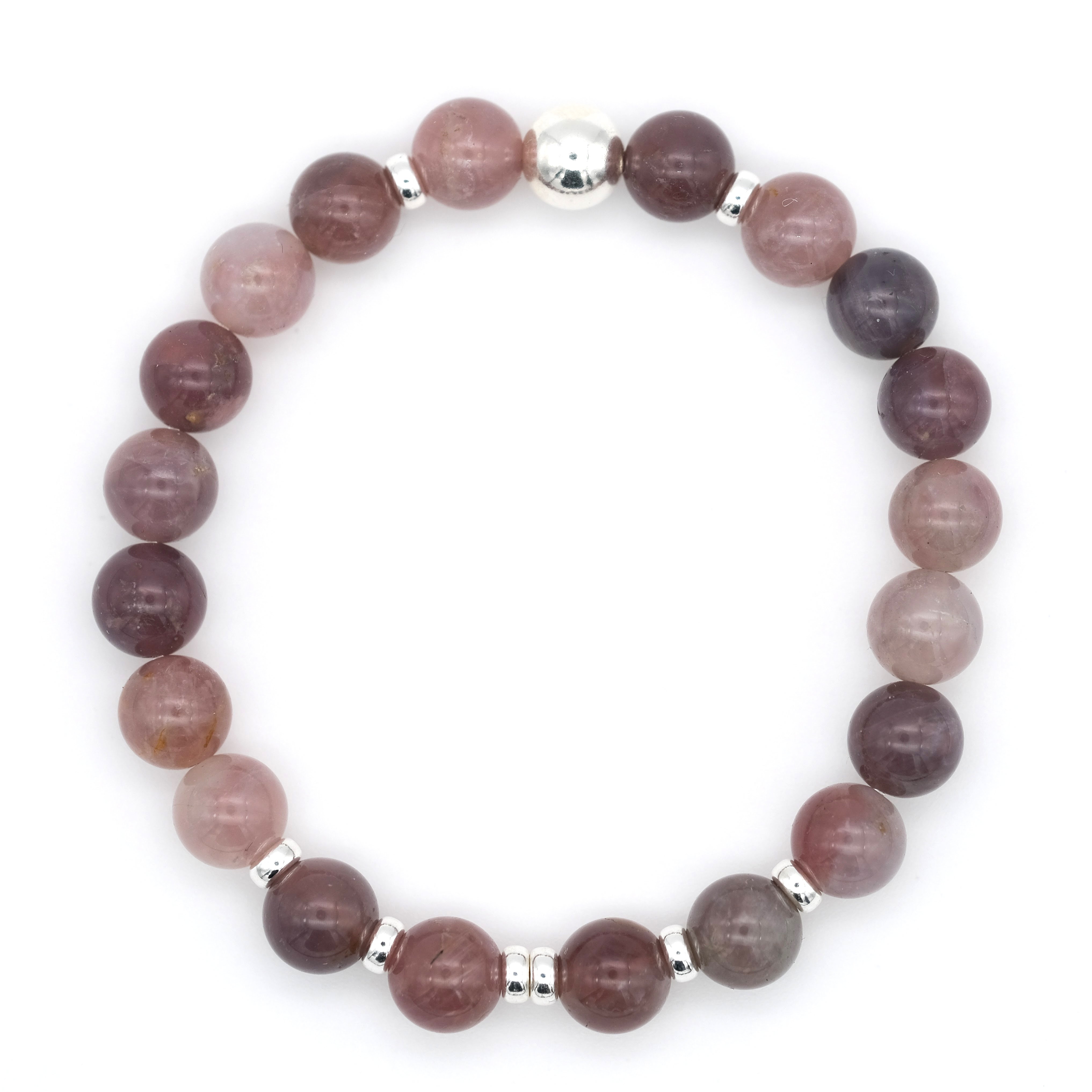 Lavender rose quartz gemstone bracelet with silver accessories from above