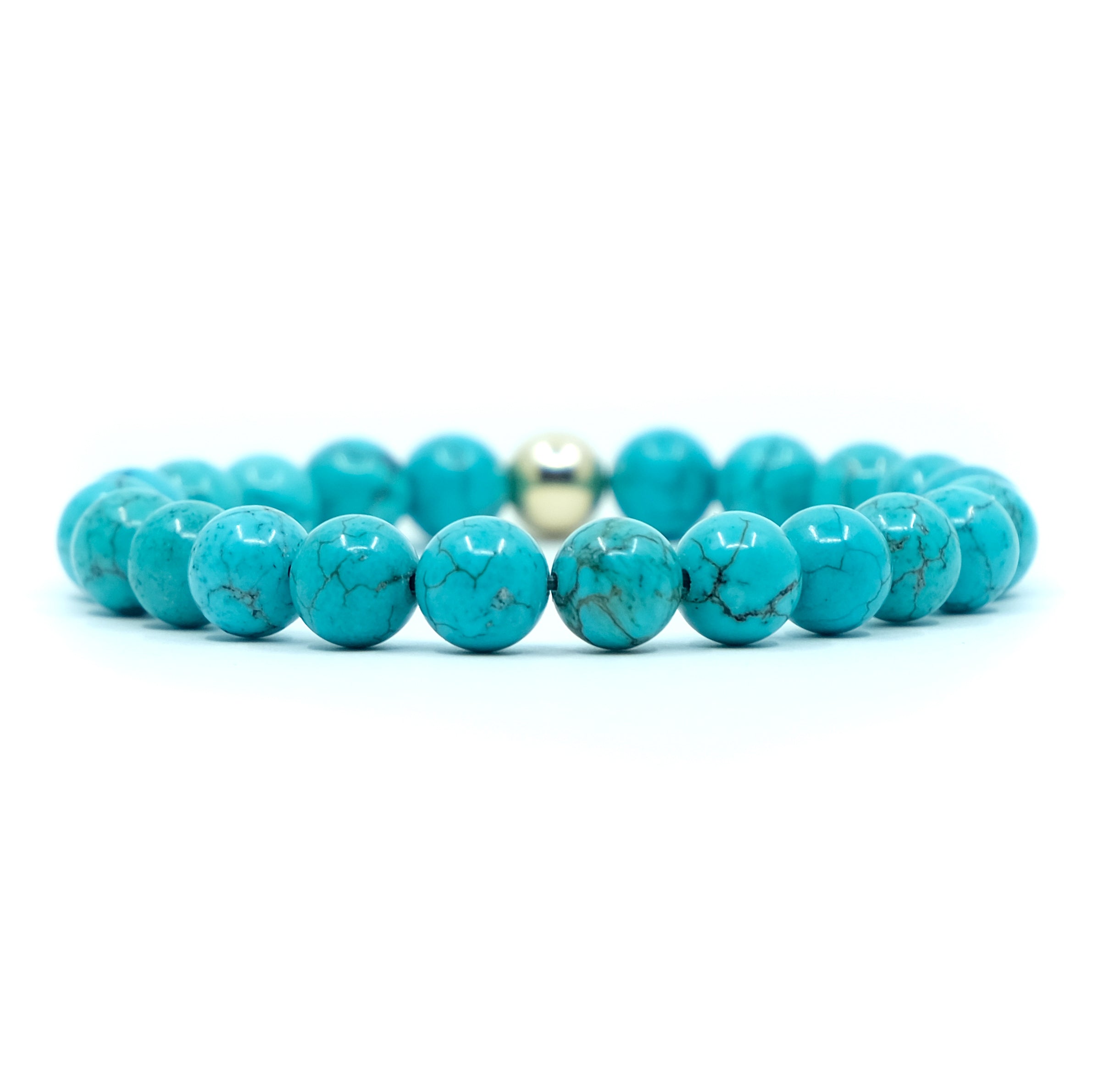 Turquoise gemstone stretch bracelet with gold filled feature bead