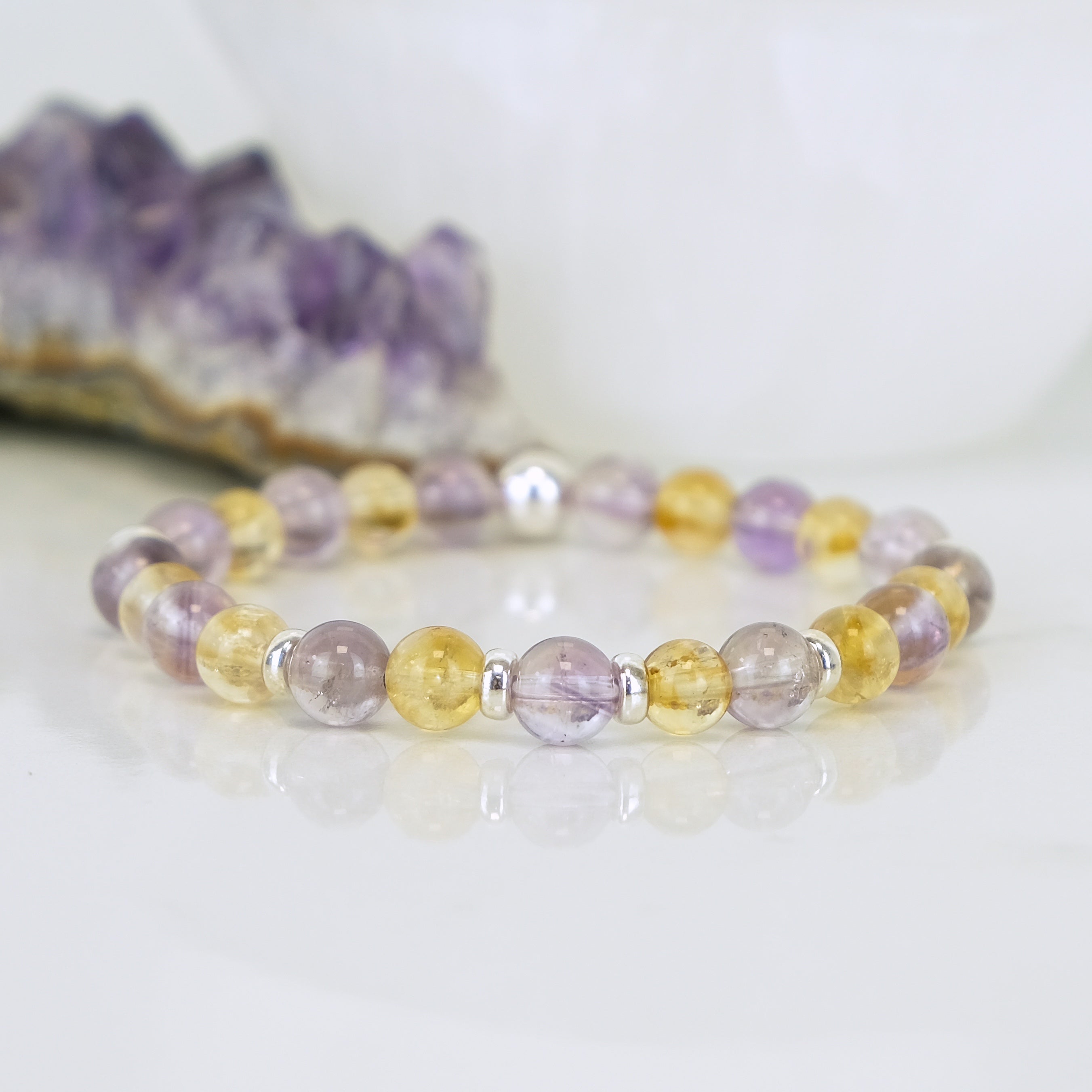 An Amethyst and citrine gemstone bracelet with 925 sterling silver accessories