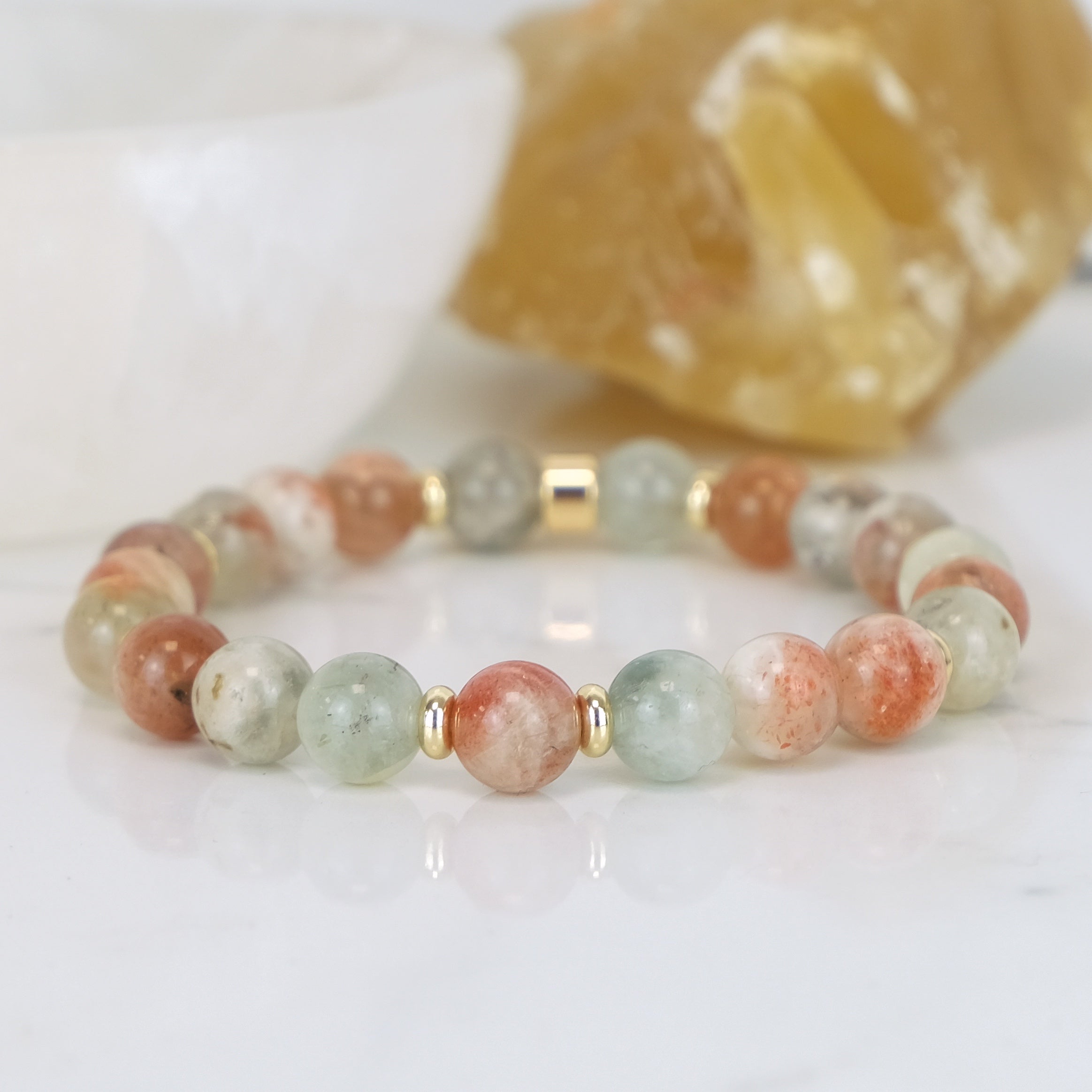 Arusha sunstone gemstone bracelet in 8mm with 18ct gold plated accessories