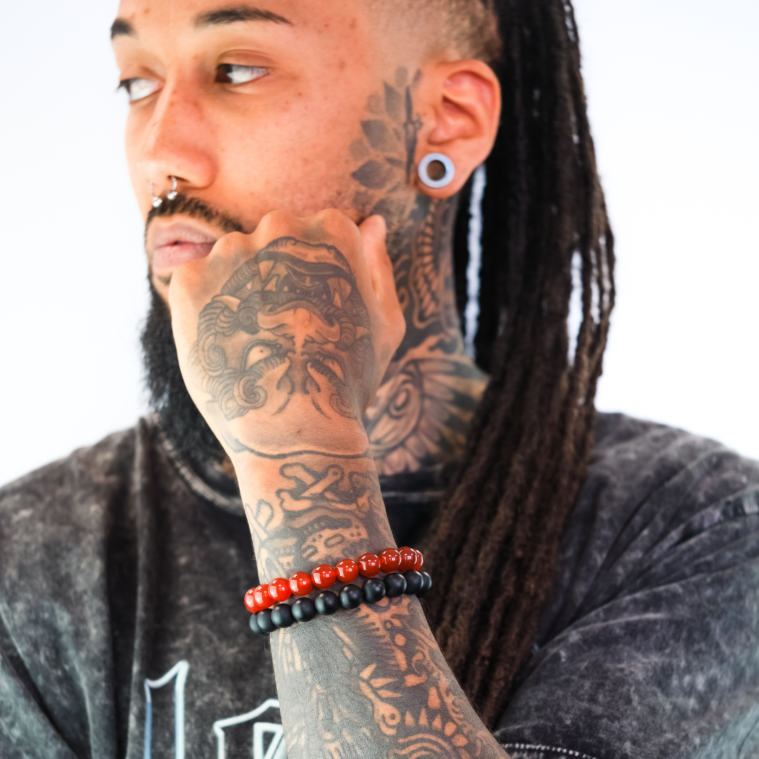 A model wearing a carnelian gemstone bracelet in 10mm beads
