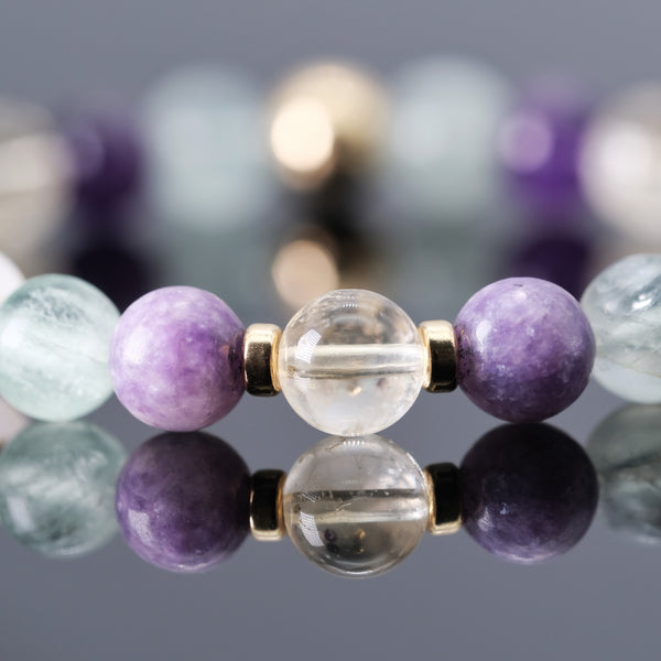 Close up image of the Samayla menopause gemstone bracelet with gold filled accessories