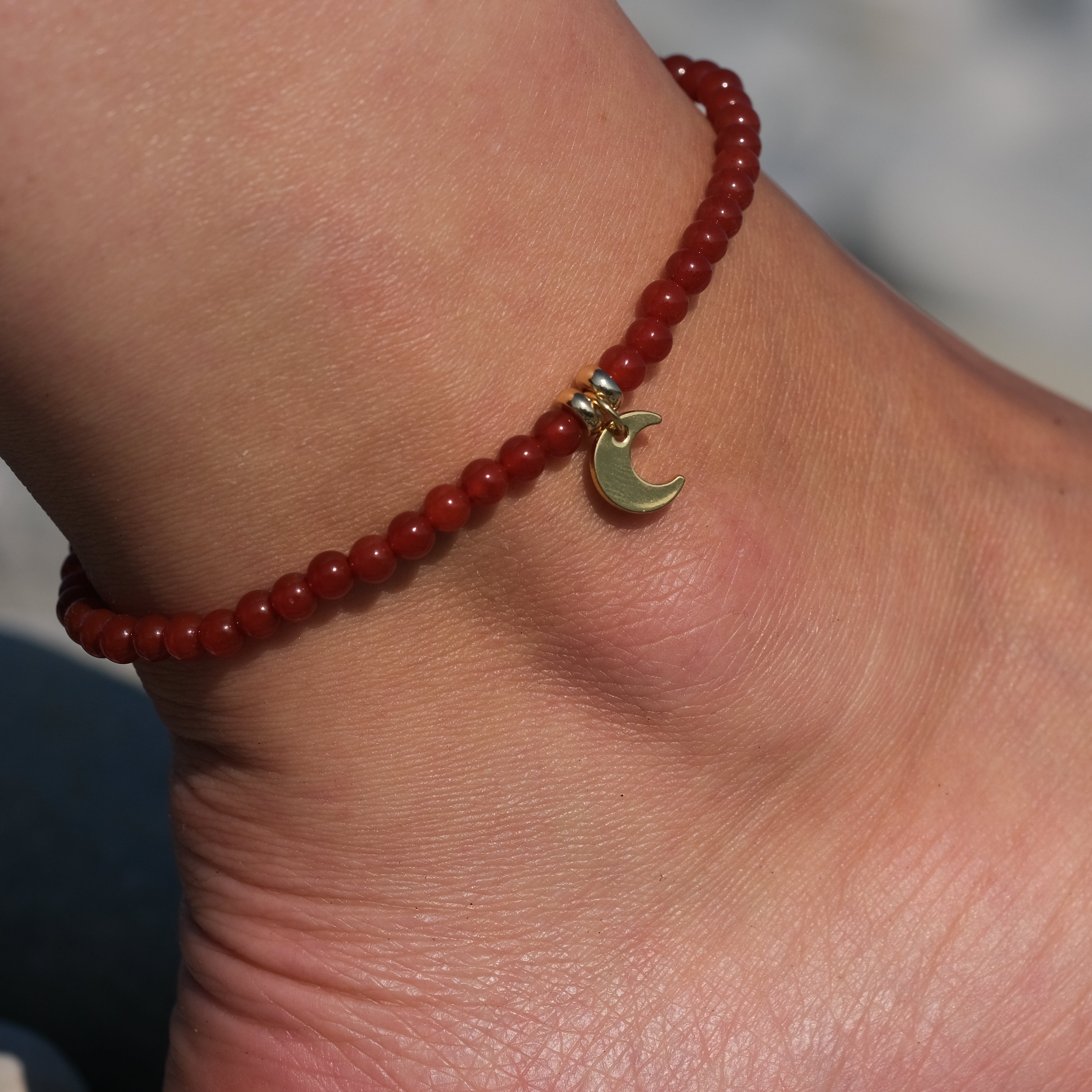 Carnelian crystal anklet with 18ct gold plated moon charm