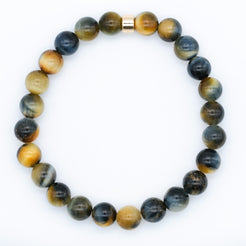 Dream tiger eye gemstone bracelet with gold accessory from above