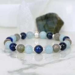 A Kyanite, Aquamarine and Labradorite gemstone bracelet with silver accessories 