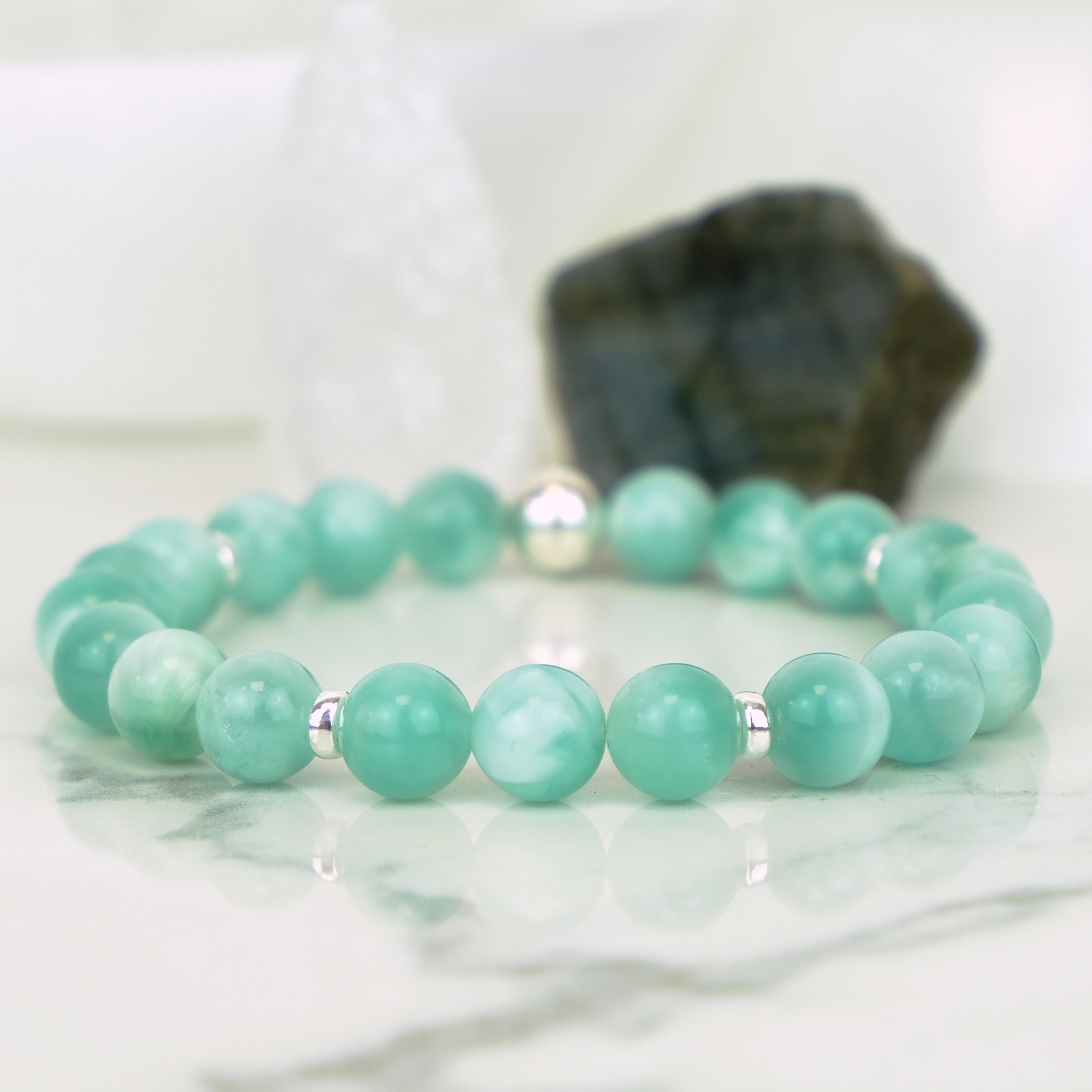 Green Moonstone gemstone bracelet with silver accents