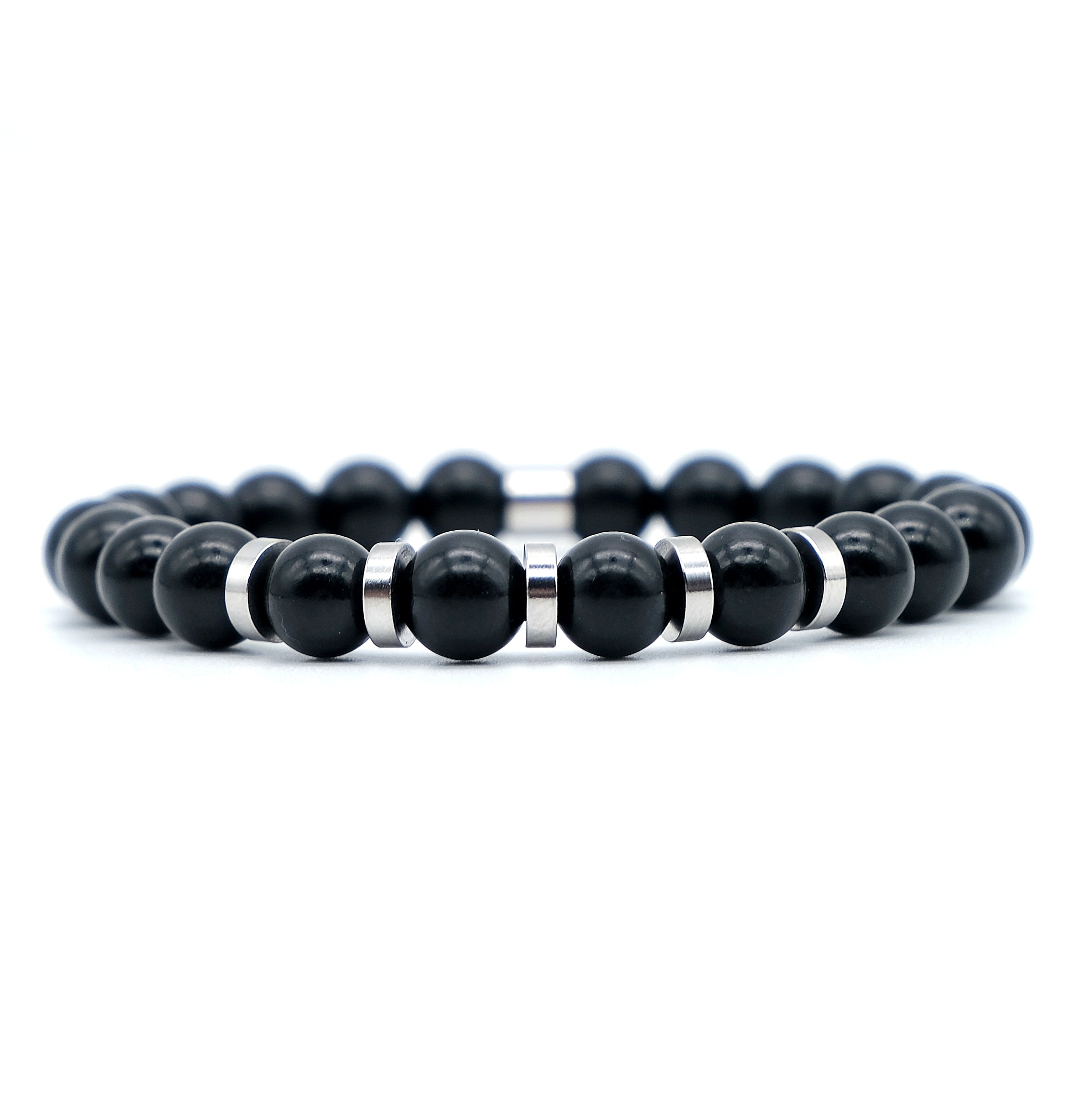 A shungite gemstone bracelet with stainless steel accessories