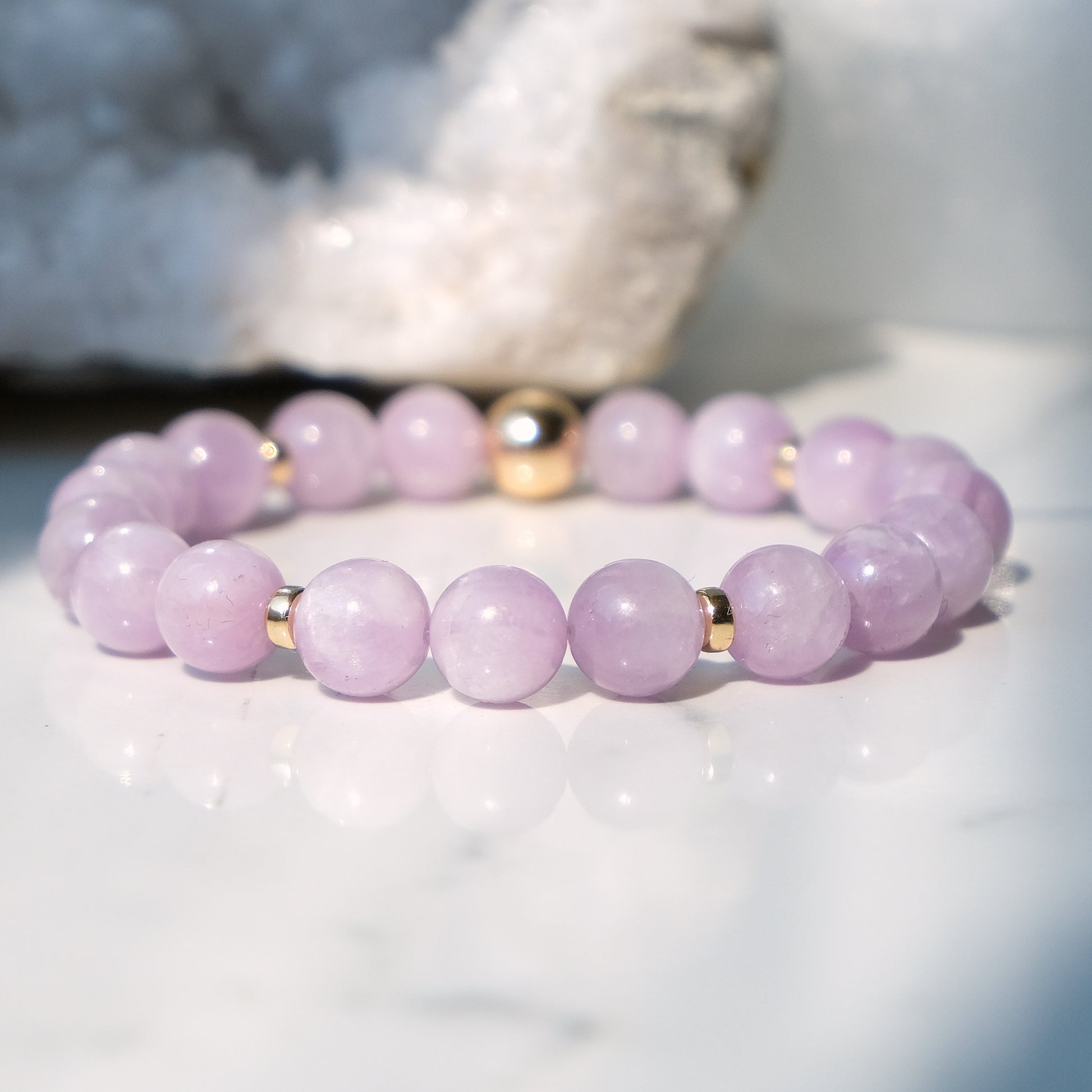 AAA grade kunzite 8mm beaded bracelet with gold accessories