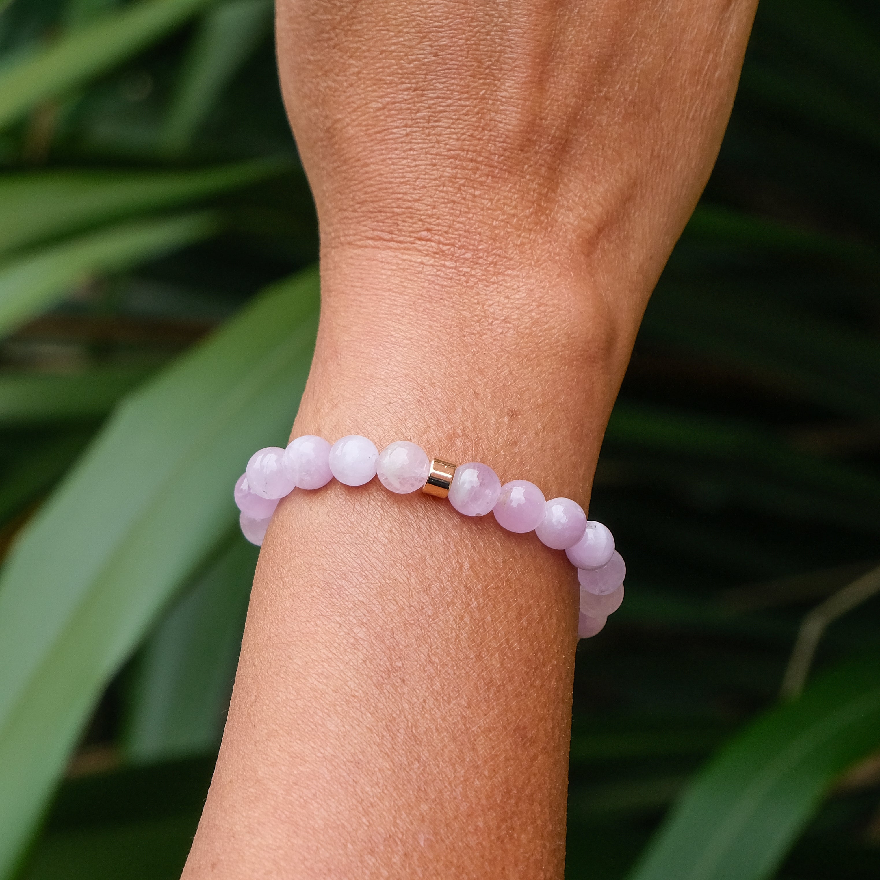 The back of a Kunzite gemstone bracelet worn by a model
