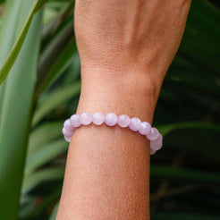 A Kunzite gemstone bracelet worn by a model