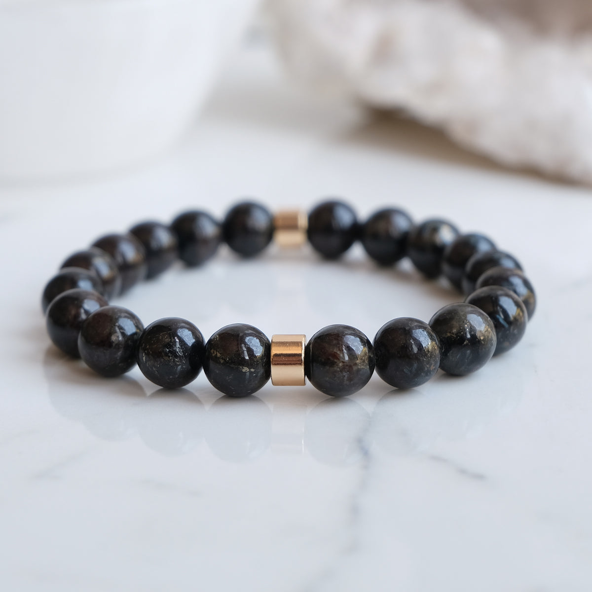 Arfvedsonite crystal bracelet with gold accessories