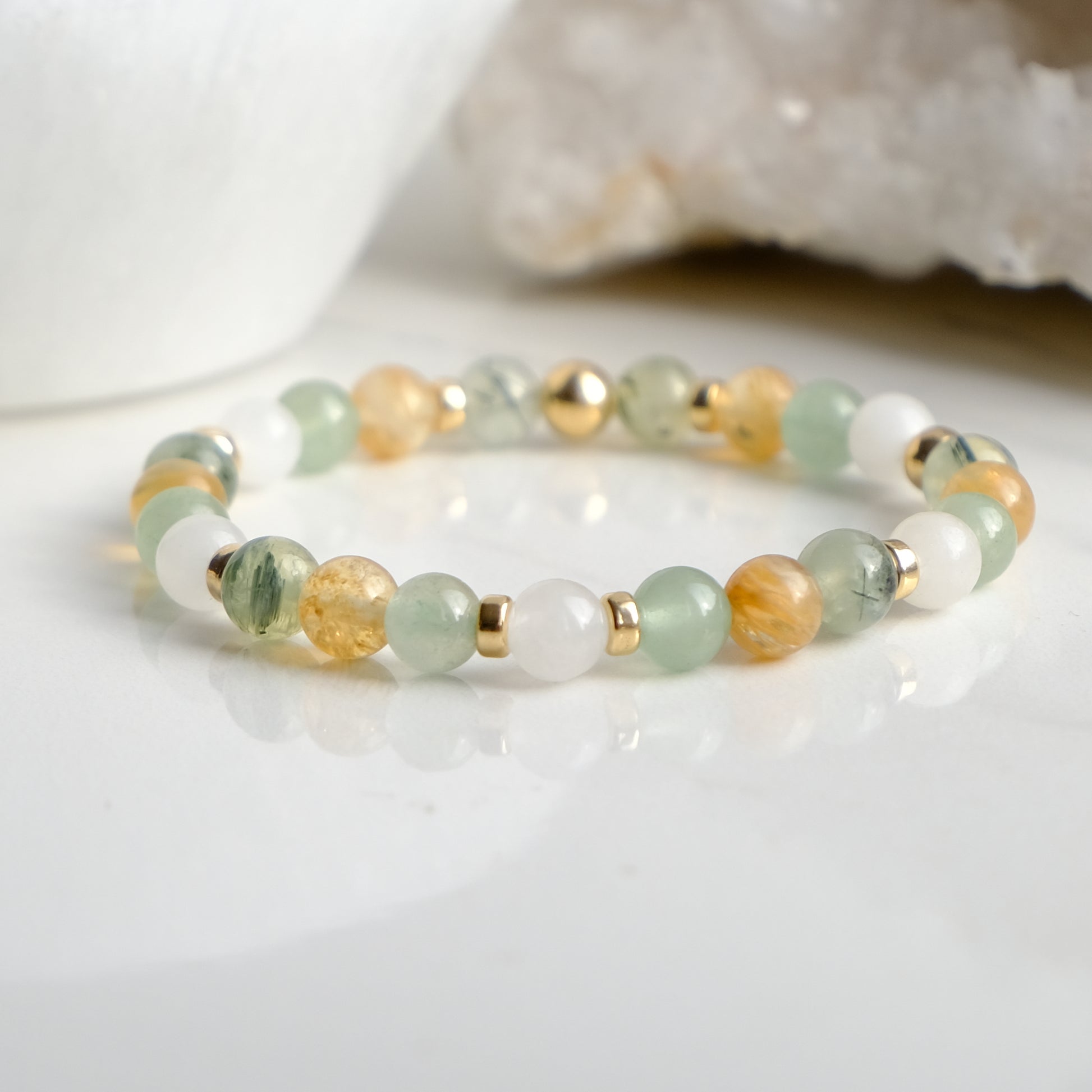 Renewal gemstone bracelet with gold accessories