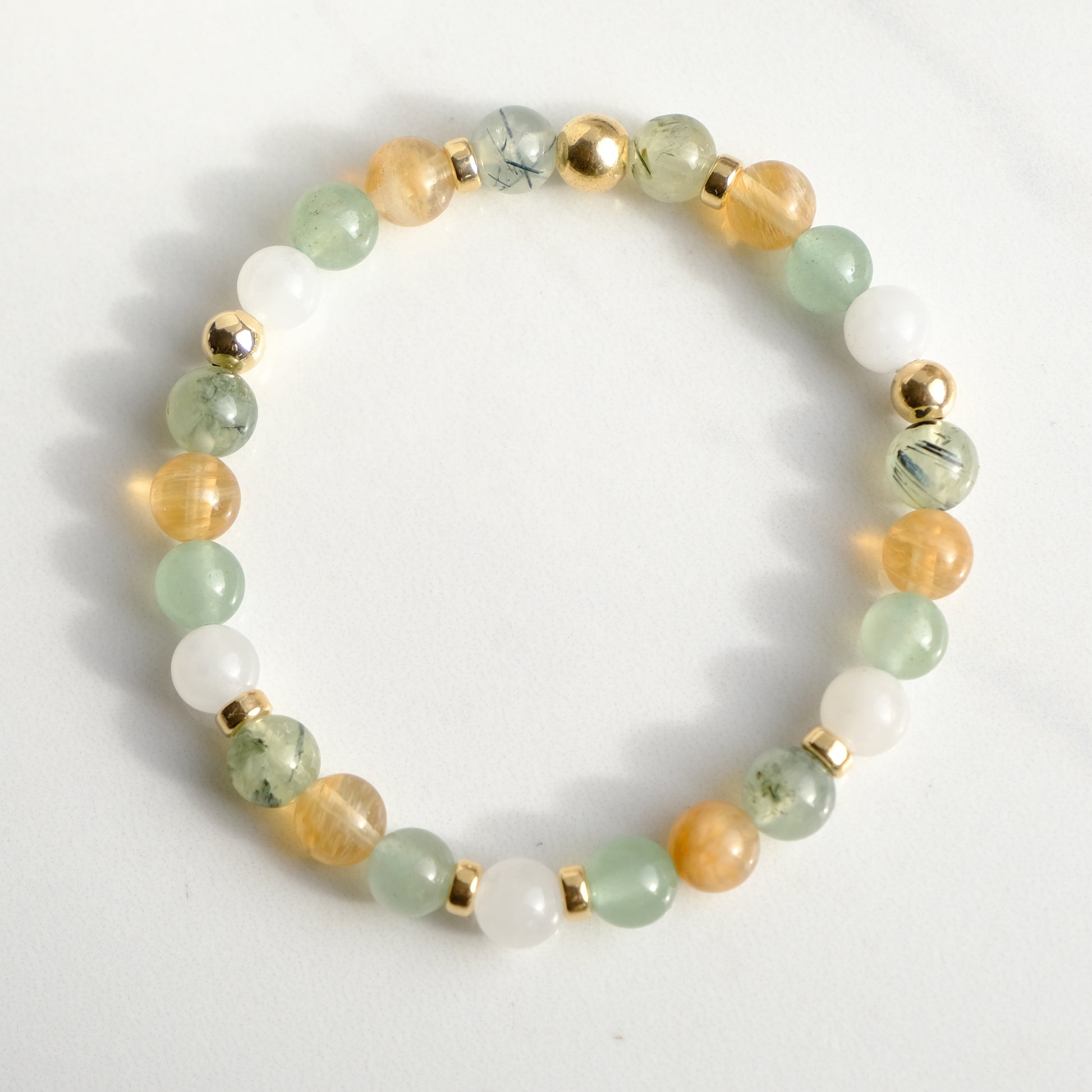 Renewal gemstone bracelet with gold accessories from above