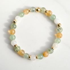 Renewal gemstone bracelet with gold accessories from above