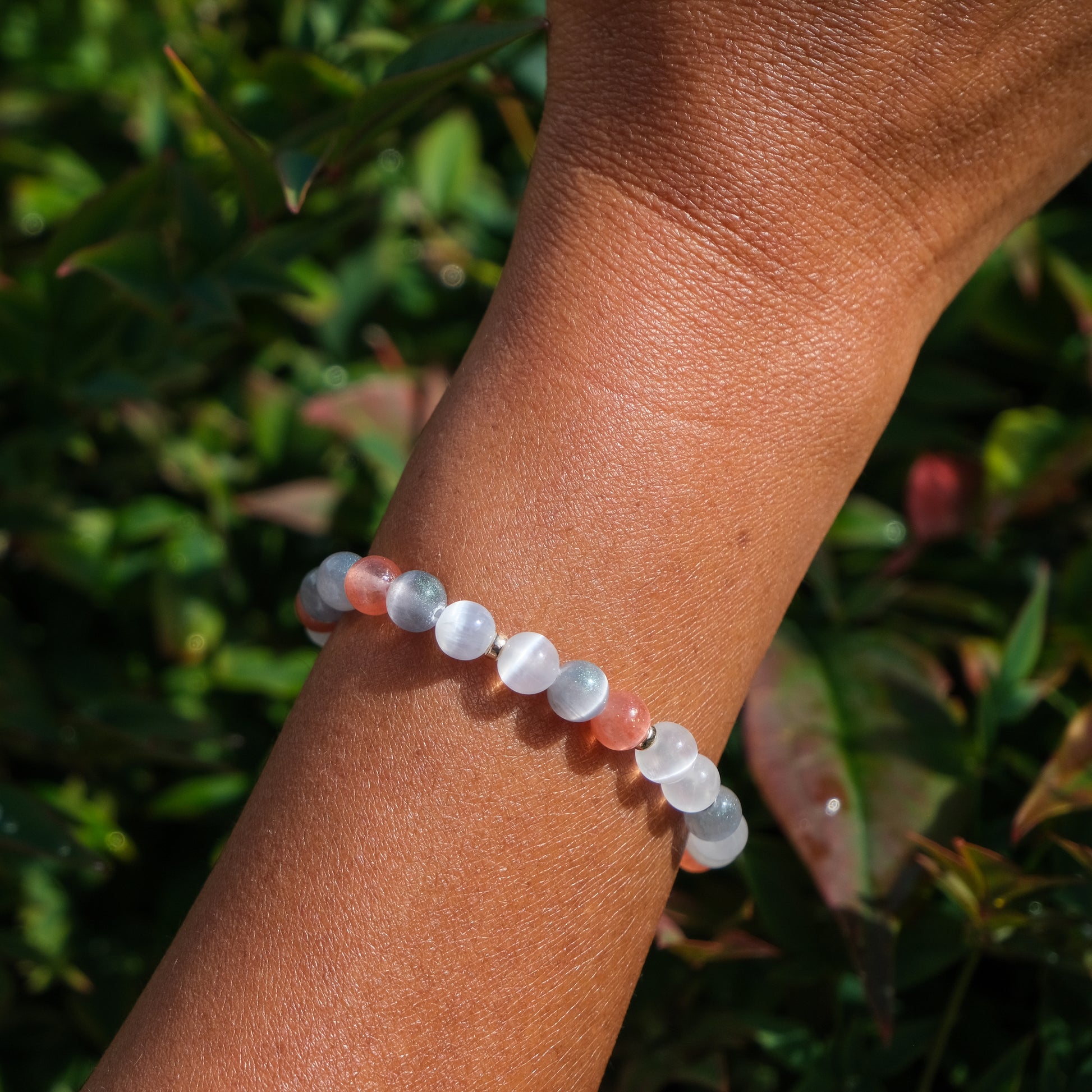Purity selenite gemstone bracelet on a model's wrist
