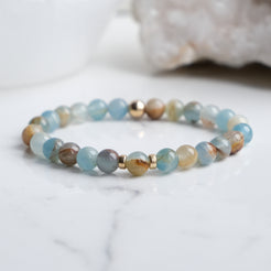 6mm blue calcite gemstone bracelet with gold accessories