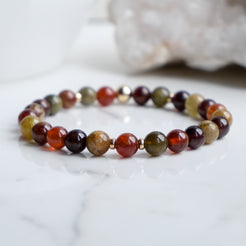 6mm Garnet gemstone bracelet with gold accessories