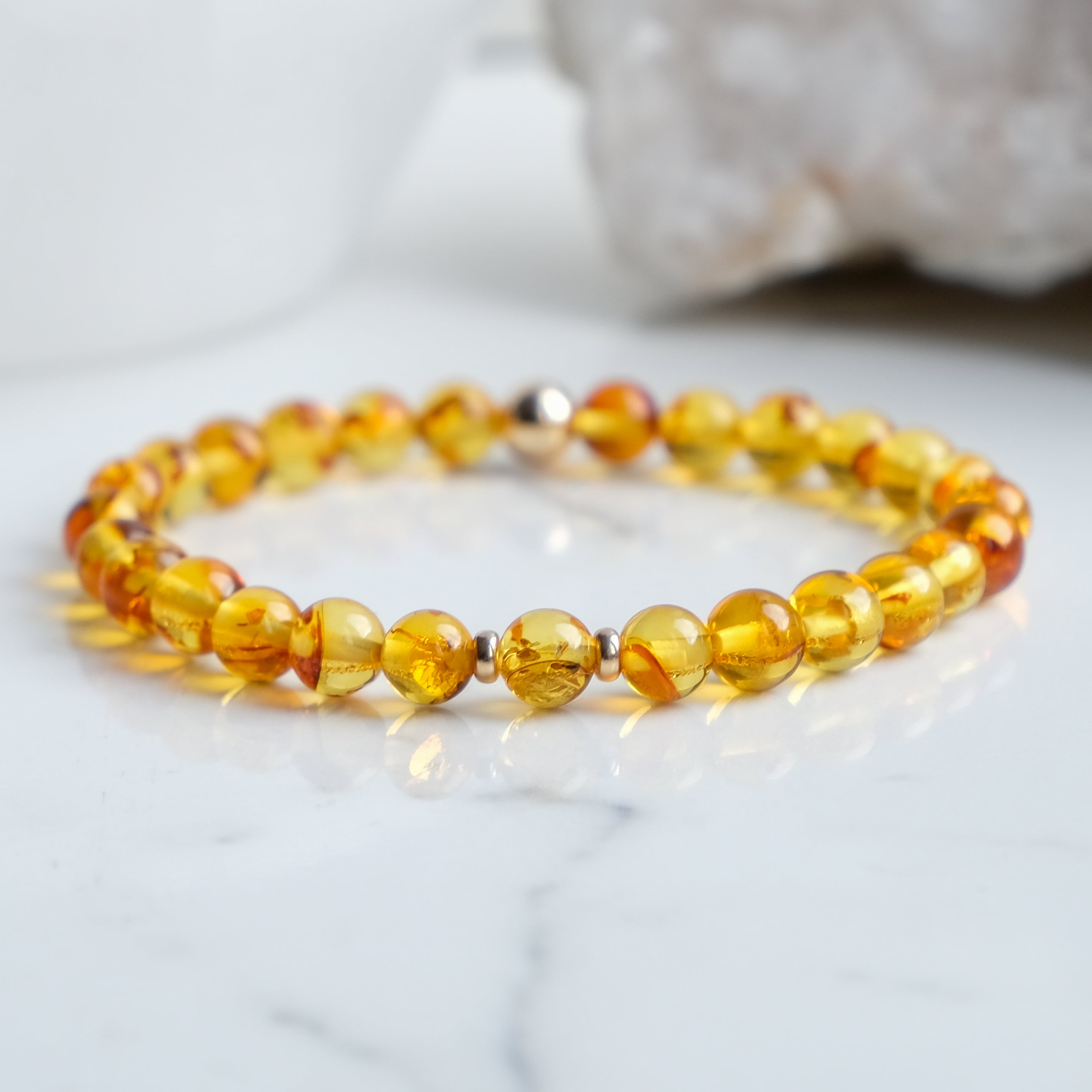 6mm Amber beaded bracelet with gold accessories