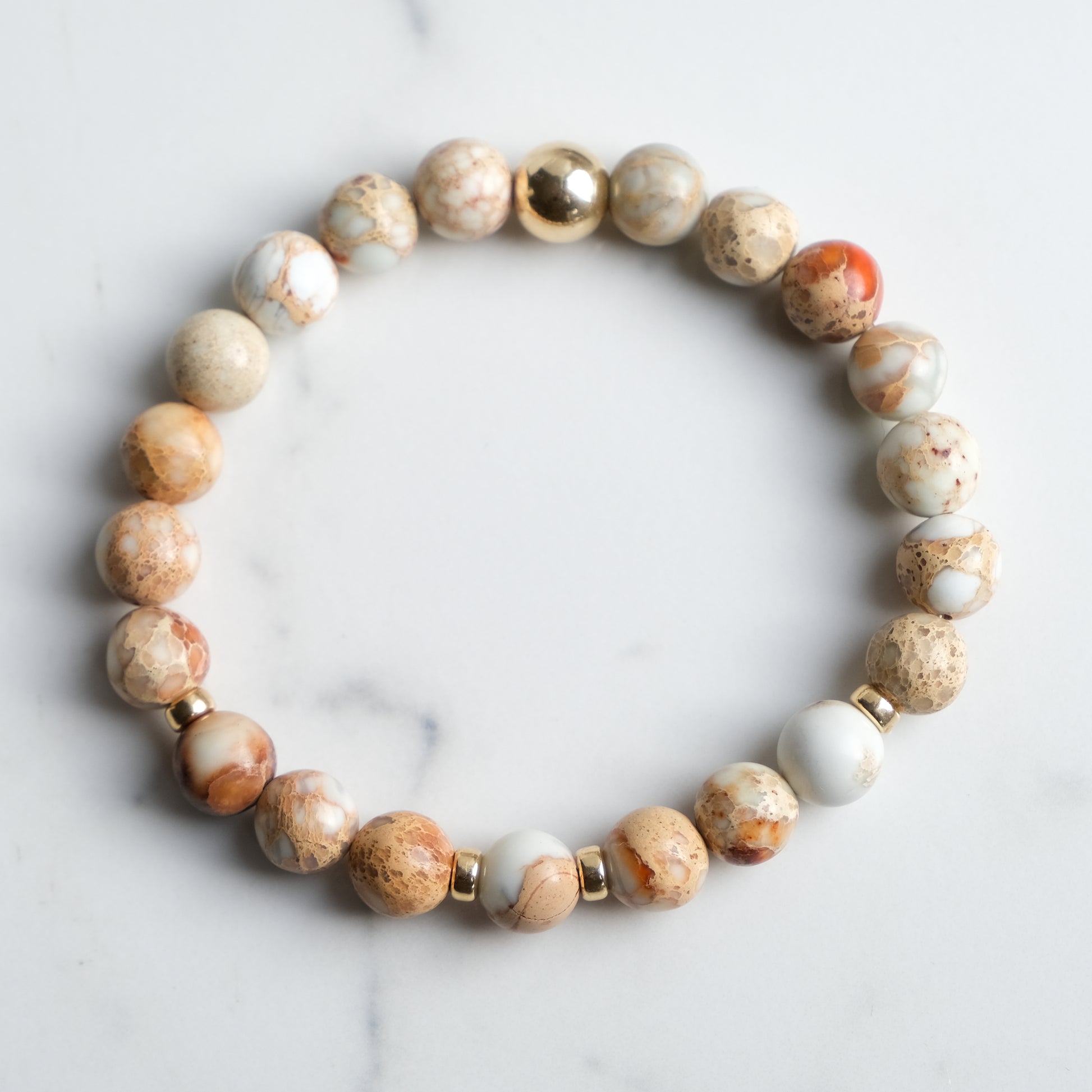 Imperial Jasper gemstone bracelet with gold accessories from above