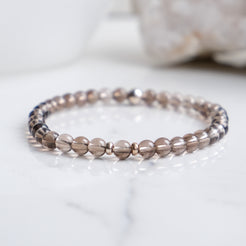 4mm smoky quartz gemstone bracelet with gold accessories