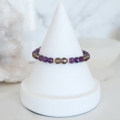 Amethyst and ice obsidian faceted crystal bracelet in gold