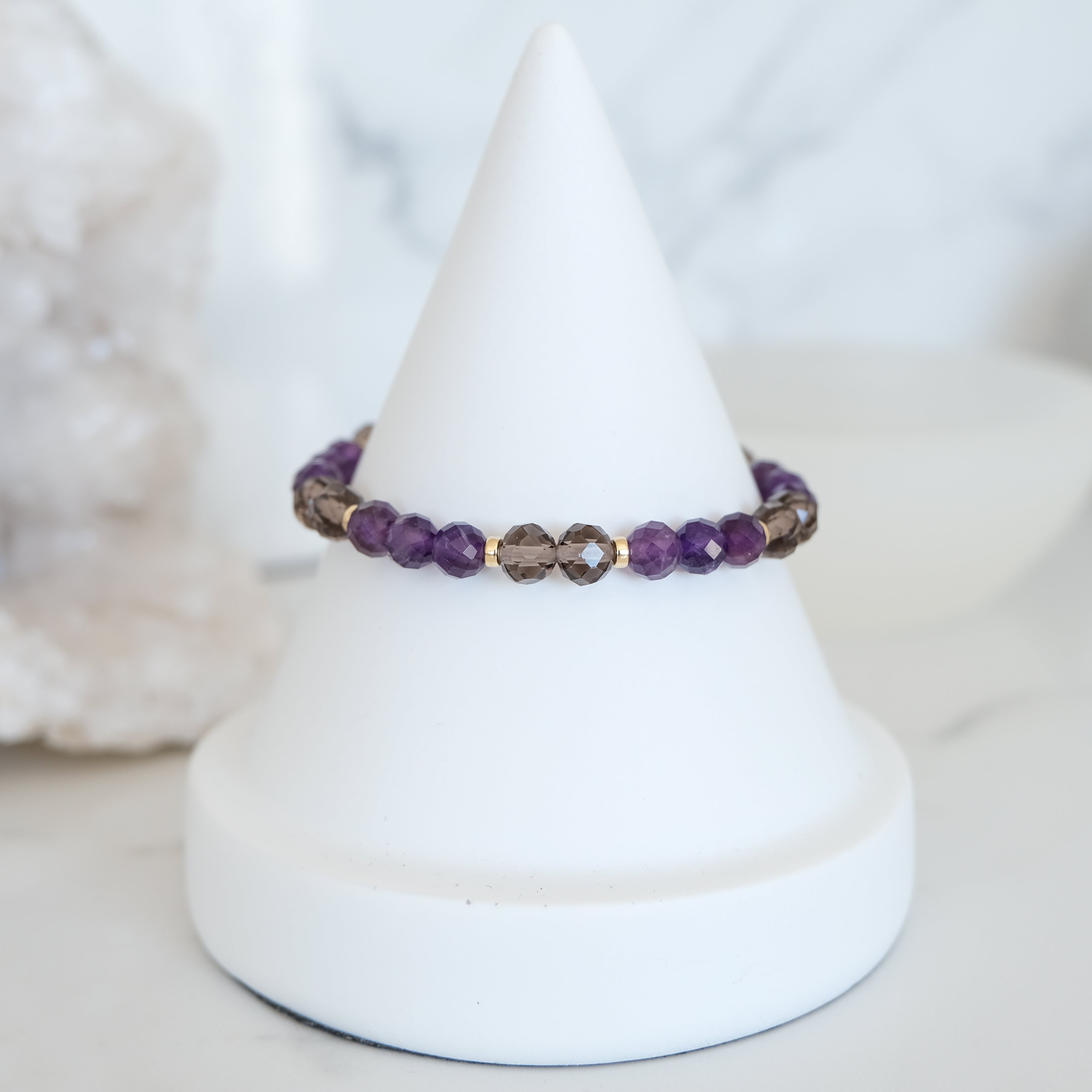 Amethyst and ice obsidian faceted crystal bracelet in gold