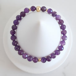 Faceted amethyst crystal bracelet from above