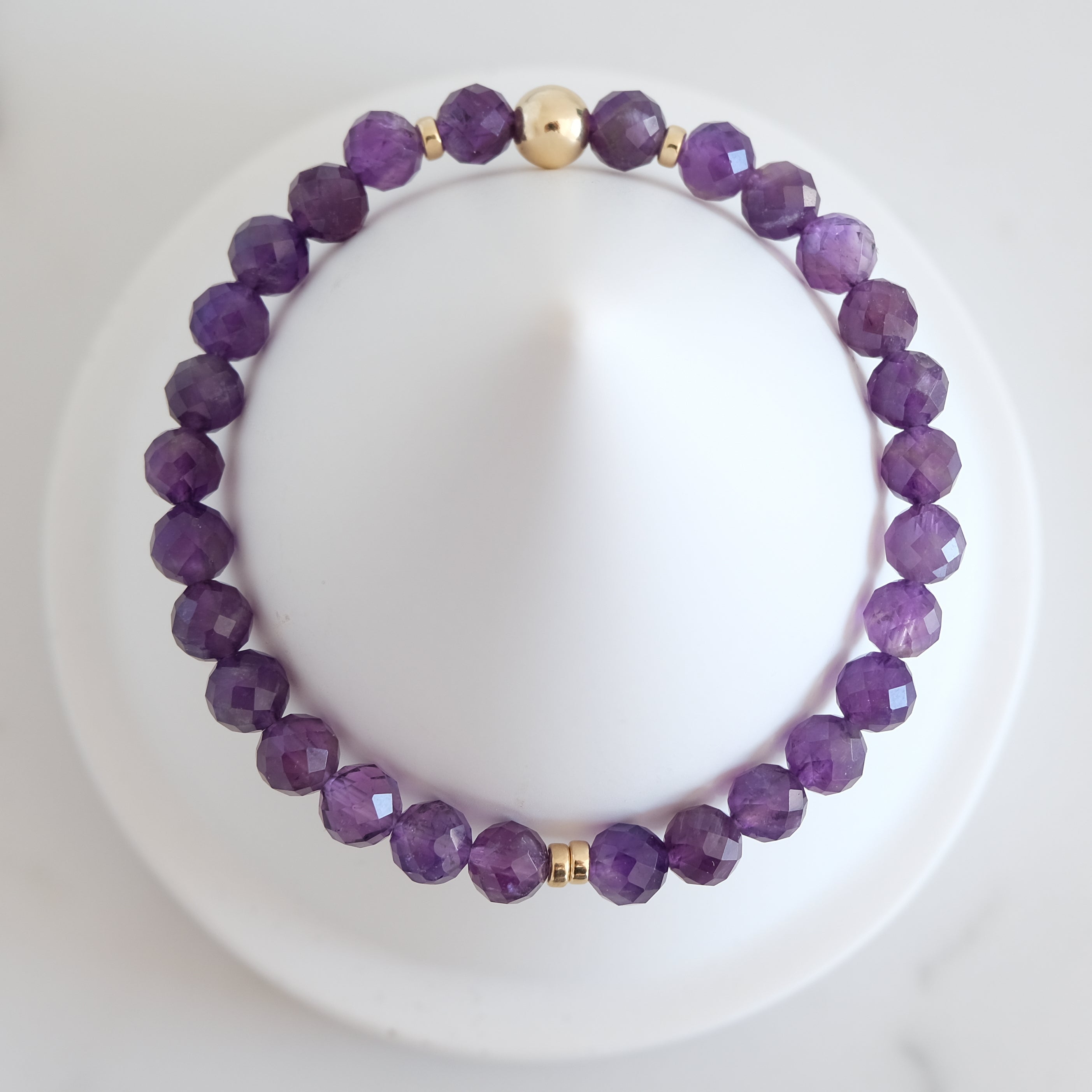 Faceted amethyst crystal bracelet from above