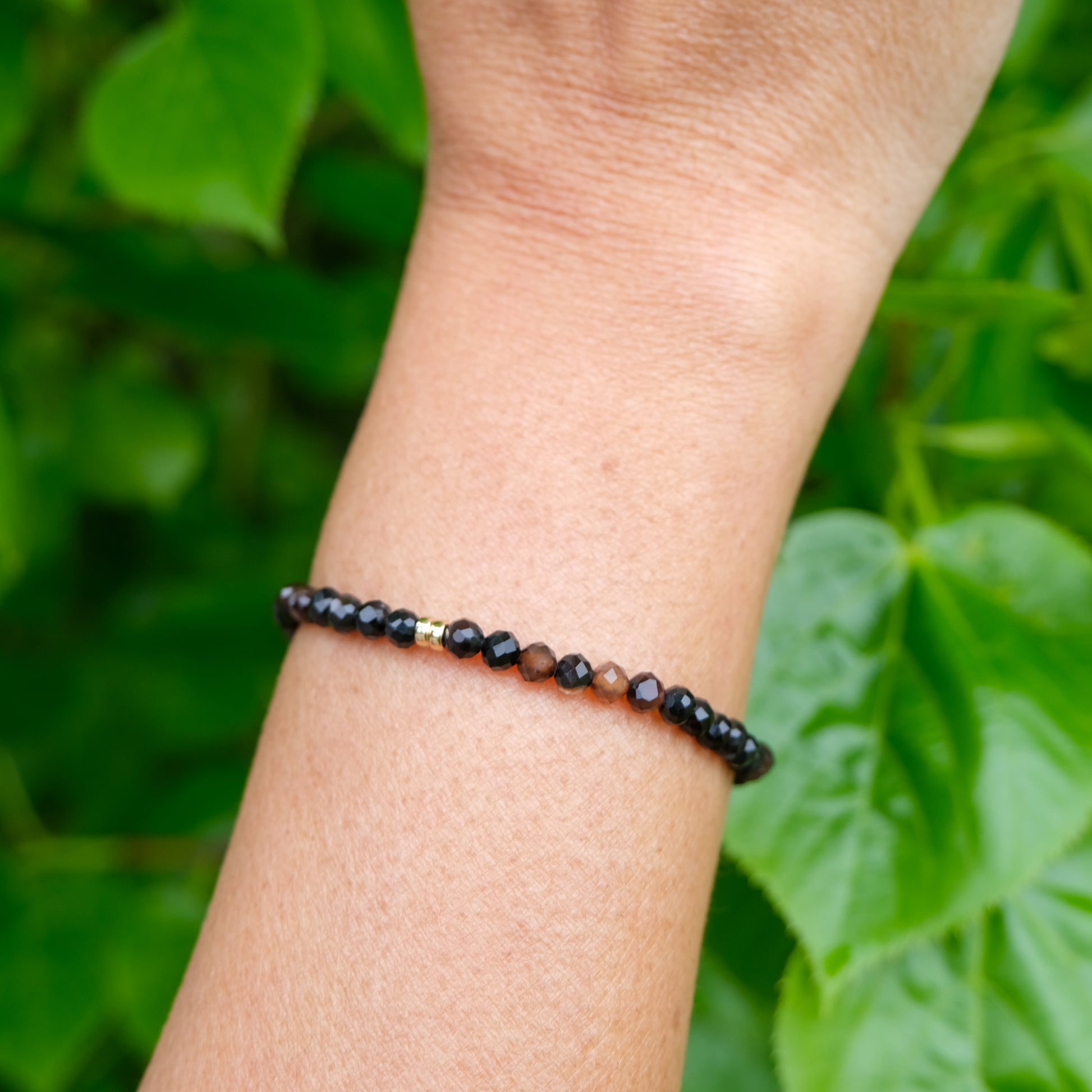 4mm Onyx faceted crystal bracelet worn on the wrist