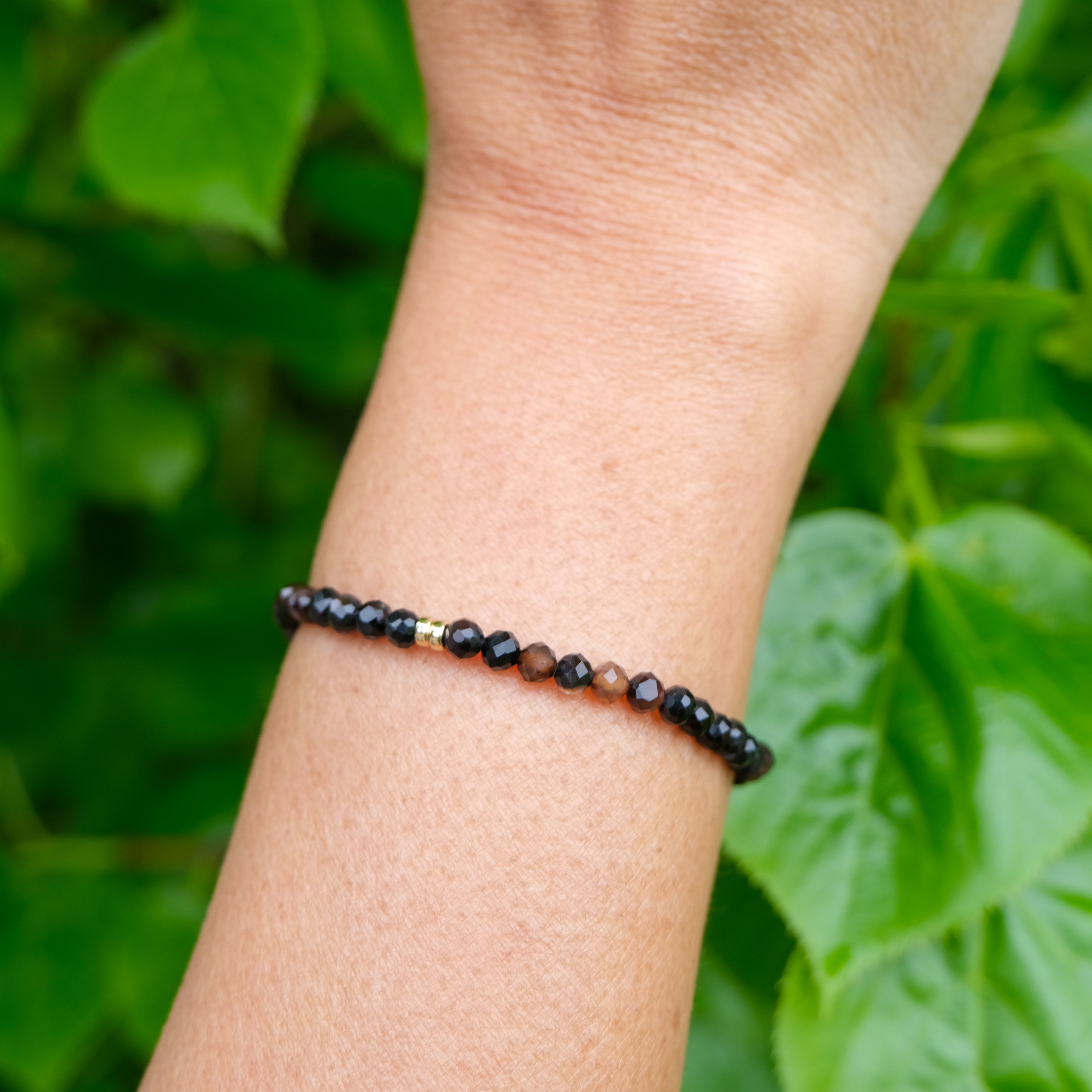 4mm Onyx faceted crystal bracelet worn on the wrist
