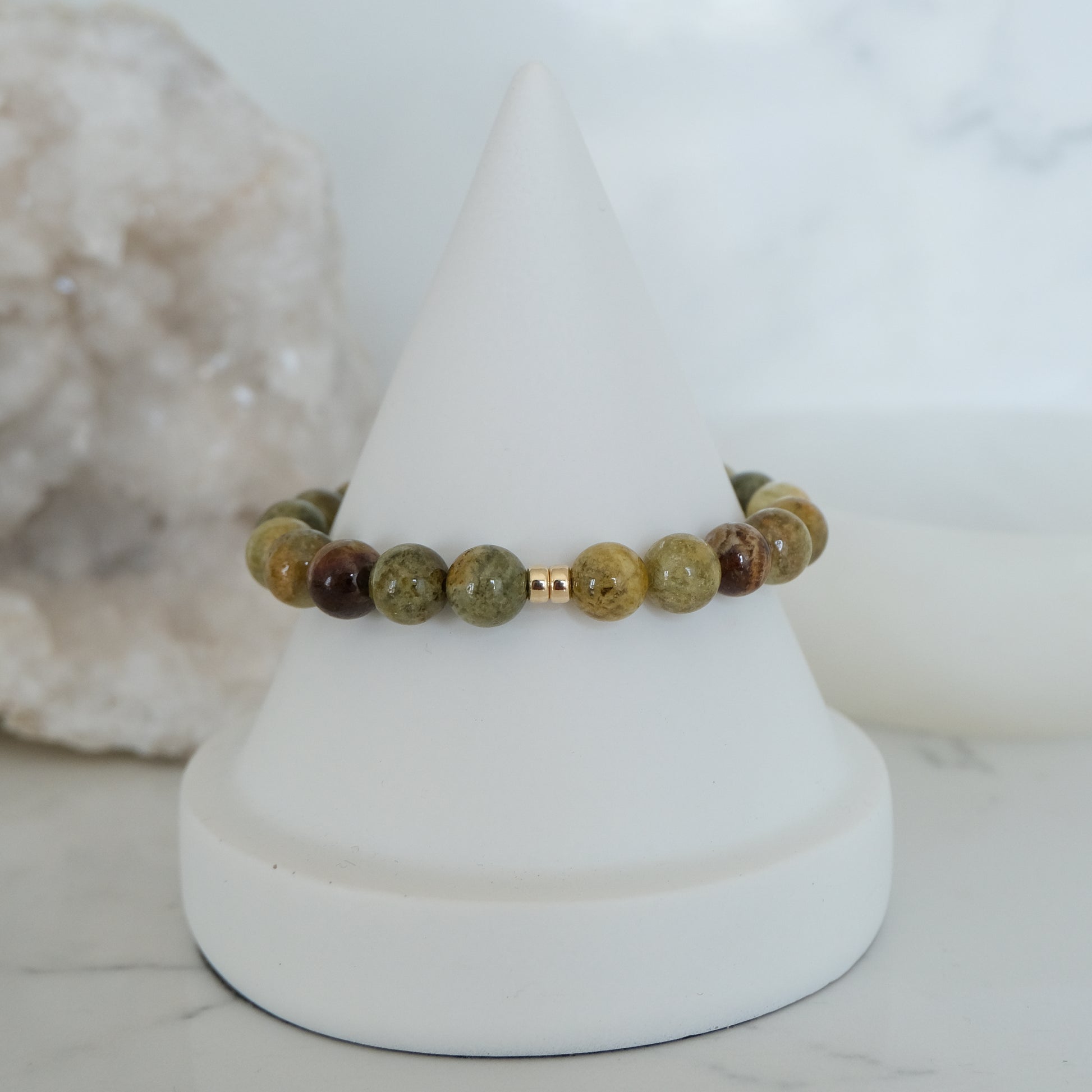 Green garnet gemstone bracelet in 8mm with gold accessories