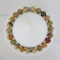 Green garnet gemstone bracelet in 8mm with steel accessories from above