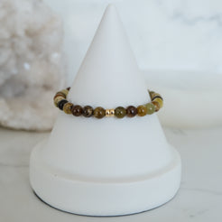 Green garnet gemstone bracelet in 6mm with gold accessories
