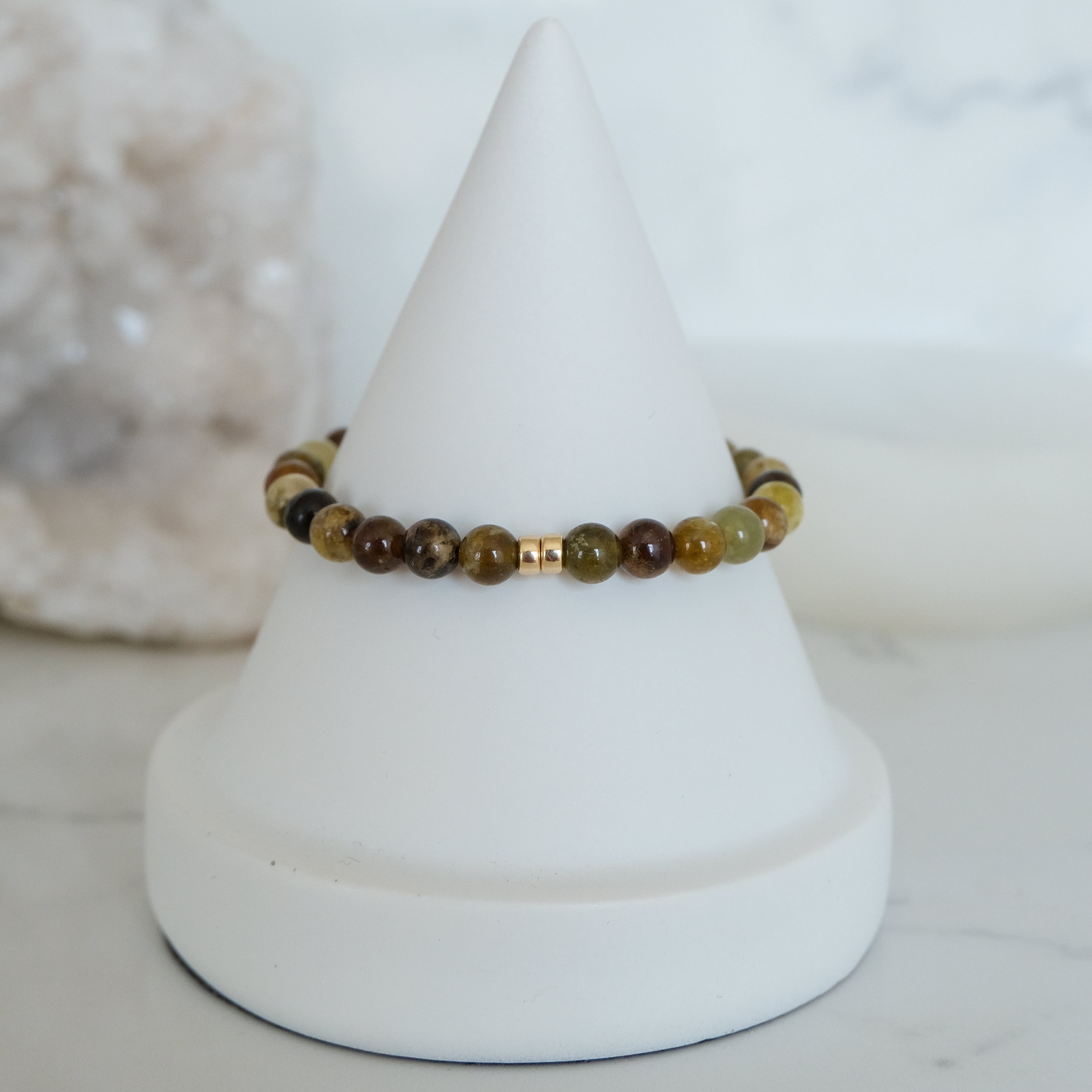 Green garnet gemstone bracelet in 6mm with gold accessories