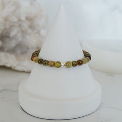 Green garnet gemstone bracelet in 6mm with silver accessories